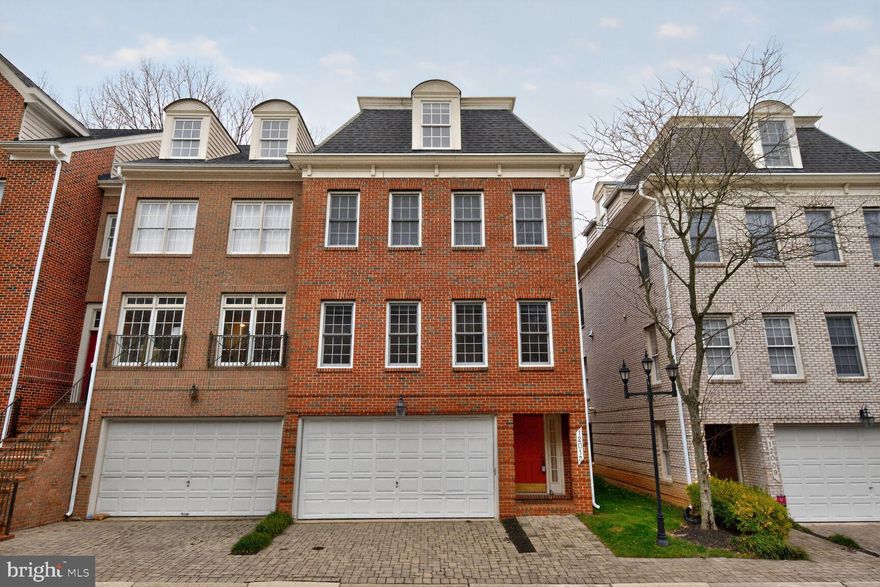 Welcome to this stunning brick end-unit, four-level townhome with a private elevator in the sought-after Montrose Park community. Flooded with natural light on every level, this beautifully maintained home offers exceptional space, comfort, and convenience—just moments from Pike & Rose, Metro, and everyday amenities. The main living level features expansive hardwood floors, an open-concept living and dining area, elegant trim detail, and a convenient powder room. The gourmet kitchen boasts cherry cabinetry, granite countertops, gas cooking, a breakfast bar, and a sunlit breakfast area that flows seamlessly into the inviting family room. Step out onto the deck—perfect for morning coffee or evening relaxation—with stairs leading down to the garden. The bedroom- level offers two generous primary suites, both with en-suite baths. The larger suite includes a spacious walk-in closet, soaking tub, and separate shower. The top floor Welcome to this stunning brick end-unit, four-level townhome with a private elevator in the sought-after Montrose Park community. Flooded with natural light on every level, this beautifully maintained home offers exceptional space, comfort, and convenience—just moments from Pike & Rose, Metro, and everyday amenities. The main living level features expansive hardwood floors, an open-concept living and dining area, elegant trim detail, and a convenient powder room. The gourmet kitchen boasts cherry cabinetry, granite countertops, gas cooking, a breakfast bar, and a sunlit breakfast area that flows seamlessly into the inviting family room. Step out onto the deck—perfect for morning coffee or evening relaxation—with stairs leading down to the garden. The bedroom- level offers two generous primary suites, both with en-suite baths. The larger suite includes a spacious walk-in closet, soaking tub, and separate shower. The top floor provides a versatile bonus room ideal as a bedroom, office, studio, or recreation space, along with the laundry room for ultimate convenience. The entry level includes a welcoming foyer, a full daylight bedroom with en-suite bath—ideal for guests, in-laws, or a private office—and a flexible sitting room or den with walkout access to the backyard. A two-car garage completes this level. Additional highlights include recessed lighting, crown molding, wood blinds, and the convenience of an elevator servicing all four floors. Ideal location with walkability to Pike & Rose dining, shopping, entertainment, groceries (Whole Foods, Trader Joe’s, Aldi), and easy access to the Red Line at Twinbrook or White Flint Metro. Imediate Avaialabilty.