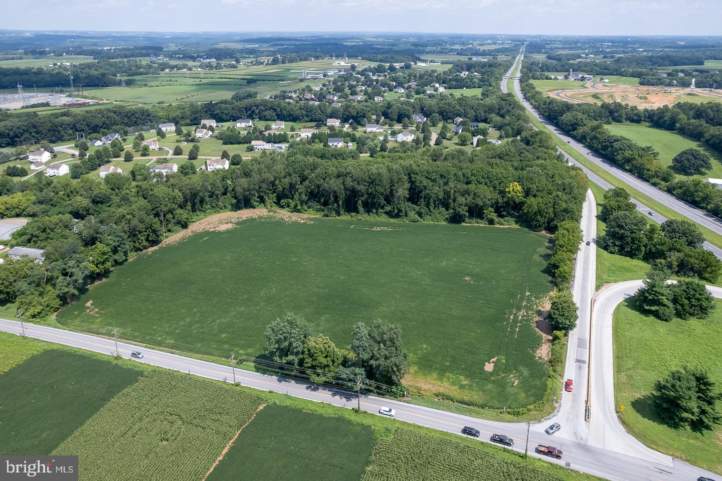 15 +/- acres located at the interchange of US Route 1 & Rt 272. Open ground, currently farmed. Prime location for convenience store, gas stations, pharmacy, hotel and many other possible uses. Check with the township for confirmation of zoning and uses.