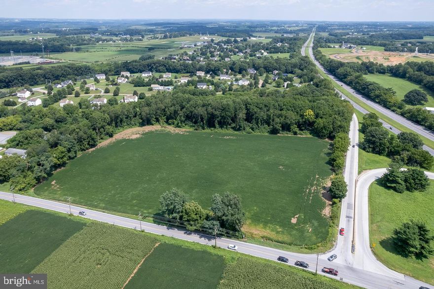 15 +/- acres located at the interchange of  US Route 1 & Rt 272. Open ground, currently farmed. Prime location for convenience store, gas stations, pharmacy, hotel and many other possible uses. Check with the township for confirmation of zoning and uses.