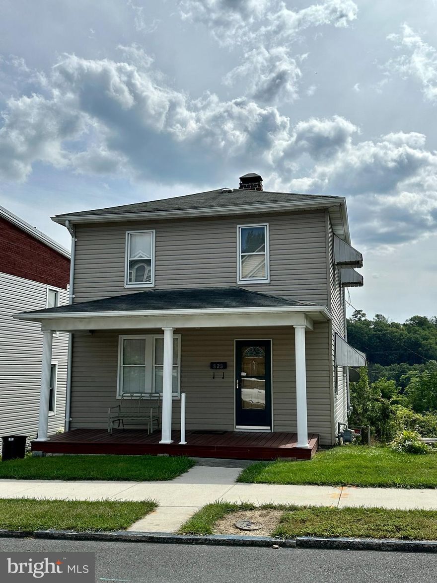 Come take a look at this detached home.  Fenced in yard with Shed/workshop.  Enjoy the evening on the front porch.  Large living room and Dining room, with hardwood under carpet.  2 large bedroom and 1 smaller bedroom.  Off street parking. Call today to set an appointment.
