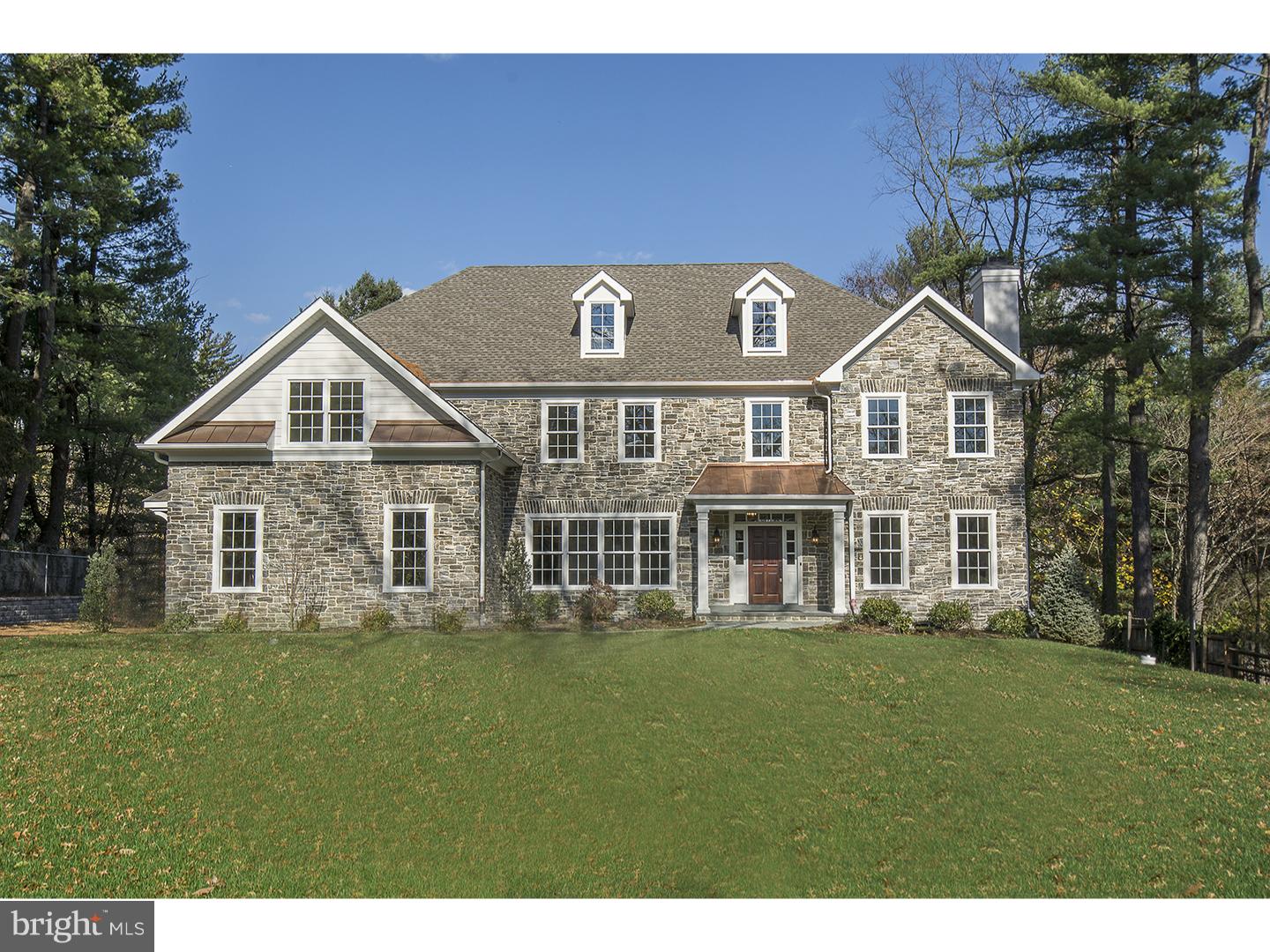 Must See this Transitional style home! Immediate Delivery! Stunning custom new construction home on Penn Valley's most coveted street with designer finishes throughout. It proudly boasts of 5 Bedrooms, 4 full + 2 half baths and a 3 car garage with wood carriage style overhead garage doors in the premier Lower Merion School District. The home flows openly, blending a desirable Kitchen/Breakfast/Family living area with a traditional Main Line colonial floor plan. Large family room with coffered ceiling and cast stone mantel on wood burning fireplace. Private main level office with views to back yard. A custom natural glistening mica stone blend adorns the front facade while durable Hardiplank wood grained siding complements the established Penn Valley neighborhood. The sophisticated Kitchen includes a tasteful design featuring Sub Zero, Wolf and Bosch appliances, a Butler's Pantry with a wet bar and Sub zero refrigerator, Walk-in Pantry, Quartzite countertops, farm sink, subway tile backsplash and low voltage cabinet lighting. The elegant custom millwork includes arched openings, and a Family Entry bench with hooks and grand crown moldings, casing and baseboard. The exquisite Master suite provides for both elegance and comfort. Here you will find a grand bedroom with tray ceiling overlooking the rear yard. Dual Master Vanities, a slipper soaking tub with classic telephone style faucet, an a spacious walk-in, multifunction thermostatic shower. His and Her closets with built in shelving and cabinetry and a private linen closet. The elegance of the home is complemented by quality of its construction. A three zone HVAC system is used with two 90% Heaters and 13 SEER condensing units. LED recessed lighting throughout. Large level back yard with flagstone patio and room for a pool. Minutes to highways, Center City and major employment centers.