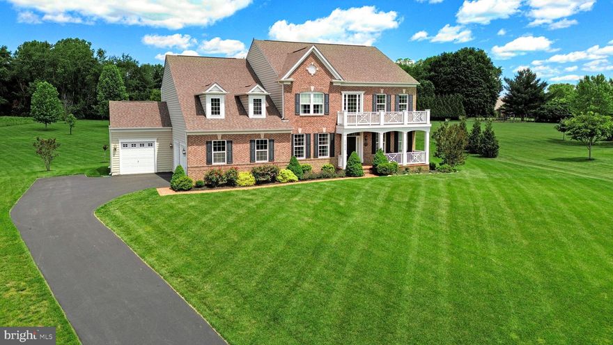 Discover 17808 Toboggan Lane, nestled on a tranquil lot in the sought-after Preserve at Rock Creek. This exceptional location borders the Rock Creek Park conservation area and offers direct access to scenic walking and biking trails — with no future development!
This brick-front Crosby model by Stanley Martin Homes boasts 7,203 square feet of light-filled living space across three finished levels, featuring 5 bedrooms, 4 full bathrooms, and a powder room.
The private 1.92-acre lot provides an expansive, level lawn and a low-maintenance Ipe deck (hot tub negotiable) — ideal for both relaxing and entertaining.
This meticulously maintained home offers countless features, including:
A SUNROOM (BUILDER UPGRADE), A LOWER LEVEL BUMP-OUT (BUILDER UPGRADE), NEW 2-ZONE HVAC (2023), WHOLE-HOUSE GAS GENERATOR, RICHLY STAINED HARDWOOD FLOORS (main level, upper landing, owner’s suite), EXTENSIVE MOLDING, RECESSED LIGHTING, OVERSIZED WINDOWS WITH WINDOW TREATMENTS, 9-FOOT CEILINGS, 2-SIDED FIREPLACE, BUILT-IN CLOSET ORGANIZERS THROUGHOUT, HUGE WALK-IN PANTRY, 3-CAR GARAGE, WALK-UP LOWER LEVEL, and more!
Step inside and feel the bright, airy ambiance as the grand 2-story foyer welcomes you. The gourmet kitchen is the heart of the home, seamlessly flowing into the sunroom, breakfast area, and family room. It features a large center island with breakfast bar, 5-burner gas cooktop, dual wall ovens with convection option, granite countertops, stainless steel appliances, crisp white cabinetry, and a classic subway tile backsplash.
The sunroom is bathed in light from three walls of windows and offers access to the rear deck. The family room, with its two-sided gas fireplace, connects beautifully to both the kitchen and sunroom.
Formal living and dining rooms, a powder room, private office, and access to the attached garages complete the main level.
Upstairs, you’ll find four spacious bedrooms and three full bathrooms. The owner’s suite includes a sitting room and an expansive dual-sided walk-in closet with custom built-ins. The luxurious, spa-inspired bath features contemporary tile, a Kohler jetted soaking tub, glass-enclosed shower, dual vanities, and a private water closet.
The expansive walk-up lower level offers a large flex space — perfect for a lounge, playroom, gym, or guest suite. It also includes a 5th bedroom/bonus room, a full bathroom, and abundant storage.
Enjoy a prime location with convenient access to shopping, dining, entertainment, and major commuter routes. Nearby parks, recreational amenities, and golf courses add to the appeal — all within the top-rated Montgomery County school system.