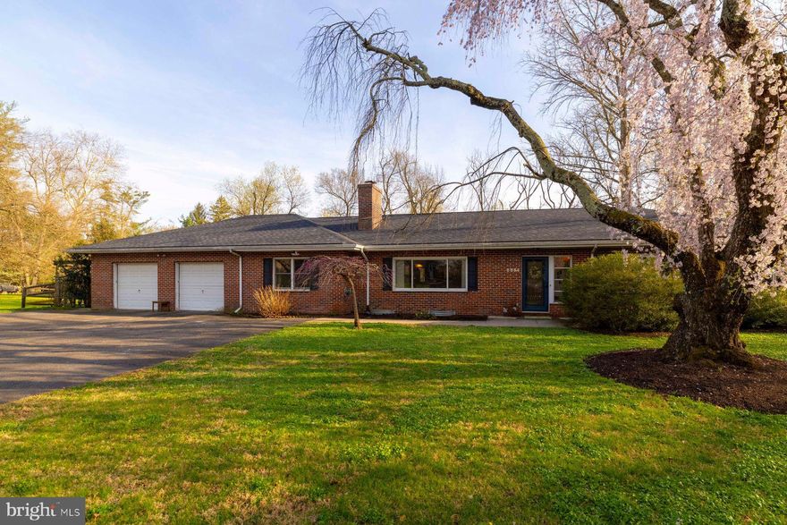 Welcome to 6254 W Valley Green Road! Single floor living that borders the beautiful Fort Washington State Park. Enter the warm foyer with coat closet and you feel welcomed right away. The living room, kitchen, and dining room are located in the center of the home and are the hub for everyday life! The kitchen has been renovated and is neutral and very clean. With an open concept to the formal dining room, entertaining flows easily. The living room is very spacious, with a fireplace, and is one of three possible rooms for relaxing and spending time together. Down the hall, you'll find three bedrooms and two full bathrooms. The rooms are well sized and bathrooms cheery. There is a bonus room on the first floor that could be used as a fourth bedroom, office, or den, it also has a full bathroom! There is a proper laundry room off the kitchen. As well as access to the sunporch, a truly special part of the house because of the serene view...it is a prime location for morning coffee on a summer day. The lower level is spacious, with a large finished portion and room for a home gym. A two car garage completes the home's footprint and makes coming and going easy in any weather. The current owners have done the work for you, updated the kitchen, replaced all windows and doors, installed solar panels that are owned outright and cut down on energy costs, new hardwood flooring, new roof(2021), heating system(2021), new septic system(2011), new water heater(2021), and more. The home is in a flood zone, buyers will need to carry flood insurance. See the disclosure for steps current owners have taken to mitigate risk. Located in desirable Flourtown, walk to shops, movies, restaurants, all from your private path through the park! Don't miss this meticulously cared for home!