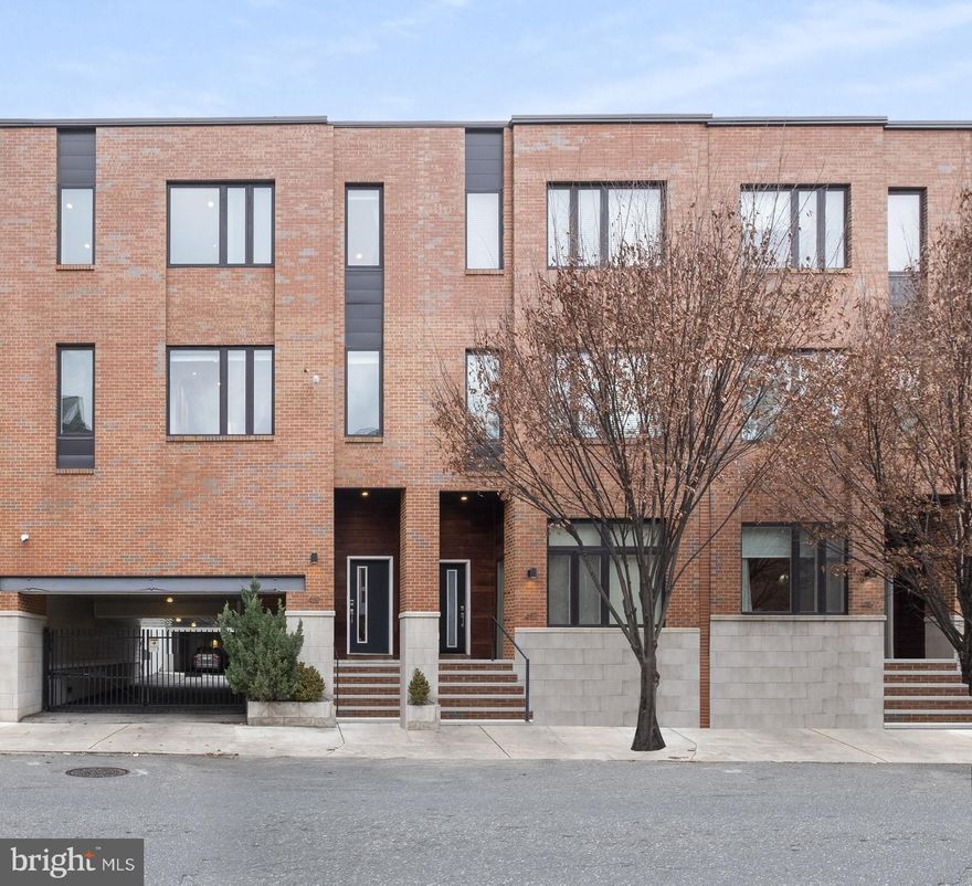 NORTHERN LIBERTIES HOME! The ultimate in high-end urban living.
This sprawling residence is ideal for the city dweller who is looking for it all! 
The first two levels of this 3,700 Sq Ft, 28 FT WIDE home are comprised of an ENTERTAINER’S dream space: an inviting den with a stunning fireplace, wet bar & first private outside space. All open living room with it's own fireplace, looking out to your sprawling kitchen with all QUARTZ countertops, BREAKFAST BAR, and dining area that seats 10 easily, as well as a smartly positioned first bedroom and elegant bath.
As you ascend to the next level of this LIGHT-FILLED property, you will find a HOME OFFICE, a true PRIMARY SUITE with walls of closets, as well as a walk-in closet, and a relaxing EN-SUITE bath with double sinks. An additional gracious bedroom, bath, and laundry complete this floor. Let the festivities begin, from your off-the-charts ROOF TOP DECK! Truly an extension of your living space, 6 months of the year. This 1,000 SQ FT rooftop OASIS, boasting a Jacuzzi, grill, wet bar, and EXTRAORDINARY VIEWS, is a SHOW STOPPER! With gated parking, 2 years ( approximately ) remaining on a real estate tax abatement, and the BEST NORTHERN LIBERTIES location, you will just love living at 419 GREEN STREET, minutes from some of the City’s best dining and coffee shops, & an easy commute to Pennsylvania, Jefferson & Cooper Hospitals!