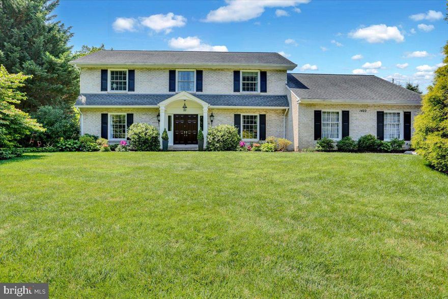 Classic Colonial Elegance in the Heart of School Lane Hills

Welcome to 1420 Valley Road, a timeless brick Colonial nestled on one of School Lane Hills’ most picturesque, tree-lined streets. This beautifully maintained and thoughtfully updated two-story home offers a rare blend of classic architectural detail and modern comfort—an ideal setting for both refined everyday living and memorable entertaining.  Recent Renovations by Brentwood Builders.

Perfectly situated on a full acre, the property features mature landscaping, a charming small stream, and a private, resort-like backyard complete with an in-ground pool and an expansive rear terrace. Whether you're hosting summer gatherings, gardening, or watching children play in the delightful playhouse, this outdoor space offers room for all stages of life.

Step inside and discover a gracious floor plan filled with abundant natural light and gleaming hardwood floors throughout both levels. The first floor is anchored by a large, welcoming foyer and includes a formal living room, an elegant private office, and a spacious family room with fireplace—perfect for cozy evenings at home. A bright and inviting sunroom off the kitchen offers peaceful views of the rear yard and pool.

The heart of the home is the updated custom kitchen, thoughtfully designed with a center island, barstool seating, and seamless flow to the formal dining room—ideal for gatherings large and small. A main-level guest bedroom and full bath, along with a laundry area, provide flexibility and convenience.

Upstairs, you’ll find four generously sized bedrooms and two recently renovated full baths. The primary suite is especially spacious, featuring a walk-in closet and a luxurious en-suite bath with a custom tile walk-in shower, double vanity, and fine finishes throughout.

Additional features include a freshly painted exterior, updated roof and mechanical systems, an attached two-car garage, and ample off-street parking. This is truly a move-in ready home, with pre-listing inspection reports available for peace of mind.

Located within easy walking distance to Lancaster Country Day School, Franklin & Marshall College, Buchanan Park, and an array of beloved restaurants, shops, and breweries, this location offers both tranquility and convenience.

Don’t miss the opportunity to make this classic School Lane Hills residence your next home.
Call today to schedule your private showing