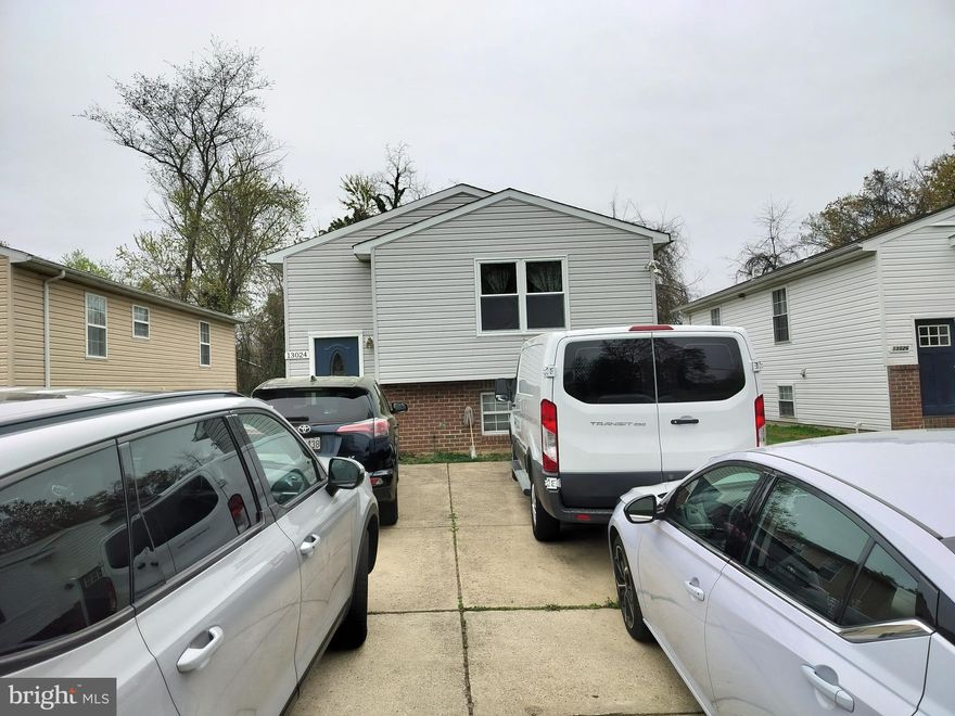 HANDYMAN SPECIAL! Fantastic Opportunity! This charming split foyer home is priced below market value, awaiting your personal touch to become your dream home. As Is Sale, Seller will not make any repairs. Offering 4 bedrooms, 3 full baths, separate living and dining rooms, an eat-in kitchen with breakfast bar, cathedral ceilings, and a finished basement with a rec room and additional bedrooms. The master bedroom features a walk-in closet, and the backyard backs to serene woods with a bonus shed for storage. Don't miss out on this great home! As is, seller will not make any repairs. Windows and front door replaced recently, rest new cosmetic updates.