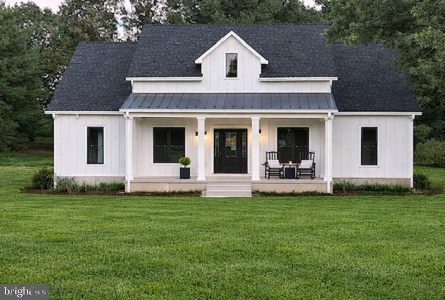 **OPEN HOUSE SATURDAY 2/21, 10-12PM!! JUST STOP BY!!**Built in 2022, this modern farmhouse offers 2,631 finished square feet above grade on a 0.69-acre lot in Warren County, with approximately 800 additional square feet of framed second-floor space ready for future expansion.
The open-concept main level provides a functional layout suited for everyday living and entertaining. The home features four bedrooms and three and a half bathrooms, thoughtfully designed for flexibility. One bedroom serves as a private suite with its own separate entrance, full bathroom, and kitchenette—ideal for extended living arrangements, guests, home office use, or potential rental income.
Constructed with efficiency and durability in mind, the home includes Smart Siding, a composition roof, and a concrete foundation. Mechanical features include a gas tankless water heater and electric heat pump HVAC system. The property is served by a private well and alternative septic system.
Additional highlights include a 1.5-story design, two-car garage, rolling topography, and no basement, maximizing usable above-grade space. The unfinished bonus area offers excellent potential for a media room, office, gym, or additional living space.
Located on Rockland Road within the Shen Valley Golf Club subdivision, this property combines newer construction with flexible living options in a well-established setting. Tax records reflect a 2025 assessed value of $689,200.