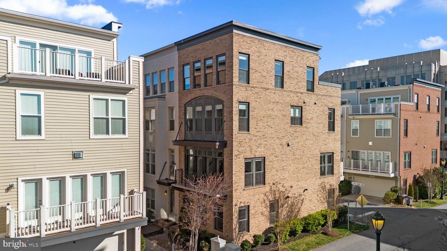 Move in ready! Michael Harris townhome in the sought after community of King Farm. The beautiful wide-plank hardwood floors throughout will beg you to walk through barefoot in your open concept living space. With two full bedrooms, a loft area with a rooftop deck, and a tandem 2 car garage - this home offers more than enough space to spread out, custom closets in each bedroom and a central vacuum system. Amenities of the community include 45 acres of parkland, swimming pools, walk/biking trails, dog park, close to shopping and restaurants, medical centers and close proximity to transportation including 1 mile from Shady Grove Metro. The seller prefers to settle at SHR Title