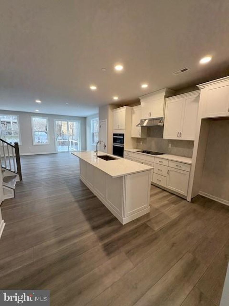 The Brentford Elite is a sundrenched end unit offers everything you are looking for...
With an open-concept floor plan and thoughtfully curated finishes, this move-in-ready home is designed for the way you live. The gourmet kitchen truly makes a statement, featuring premium finishes, upgraded cabinetry, and stainless-steel appliances. Serving as the heart of the home, the open-concept great room is highlighted by beautiful luxury vinyl flooring and offers seamless access to the deck—perfect for everyday living and entertaining. A versatile flex room provides the ideal space for a home office, playroom, or hobby area, easily adapting to your lifestyle. 
Tucked away on the second floor, the expansive primary bedroom offers a private retreat with walk-in closets and a spa-inspired bathroom suite.  Two additional bedrooms share a well-appointed hall bath, while the conveniently located second-floor laundry room adds everyday ease.
The finished basement creates additional living space that can be enjoyed in countless ways—whether for relaxation, recreation, or hosting guests.
Set within a community featuring open green spaces and scenic walking trails, this home is just minutes from everyday conveniences, making it perfectly suited for your family’s daily routine.
Experience the luxury you’ve been waiting for—schedule your private tour today.