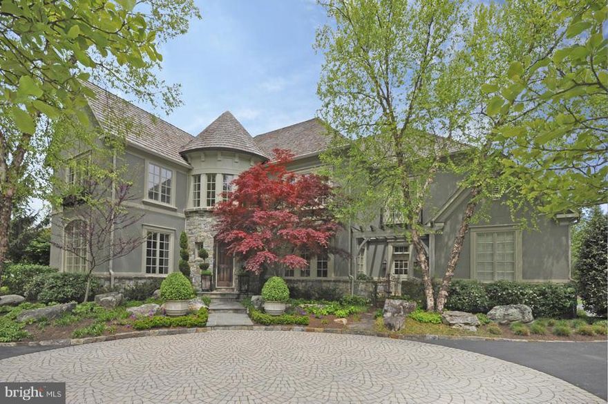 Stone & stucco colonial in prestigious Woodlea Mill on large lot! Finishes include a gourmet eat-in kitchen, 2-story family room w/ FP, paneled library, & living room w/ FP. Master suite w/ sitting area, luxurious Bath & walk-in closet.3 BR & BA complete 2nd level. The LL is perfect for entertaining & offers rec room w/ FP, billiard room,exercise room, full BR & 2 BA, wine room & bar. 3-Car Garage