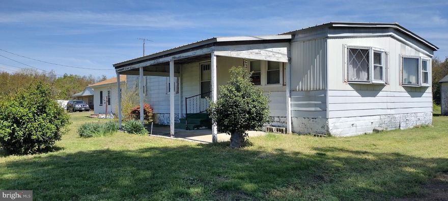 A nice get away home or year-round in a quaint beach town.   Hard wood floors and Metal roof are approx 6 yrs young.  Walking distance from the Nanticoke River and harbor. Plentiful Fishing and hunting.   Home inspections will be for the sole purpose for Buyer's knowledge only.  As Is.  Present your offers! Buyers and their Agents should do their due diligence to verify all taxes, schools and all information.  This is not a ground rent property.  Land is inclusive.