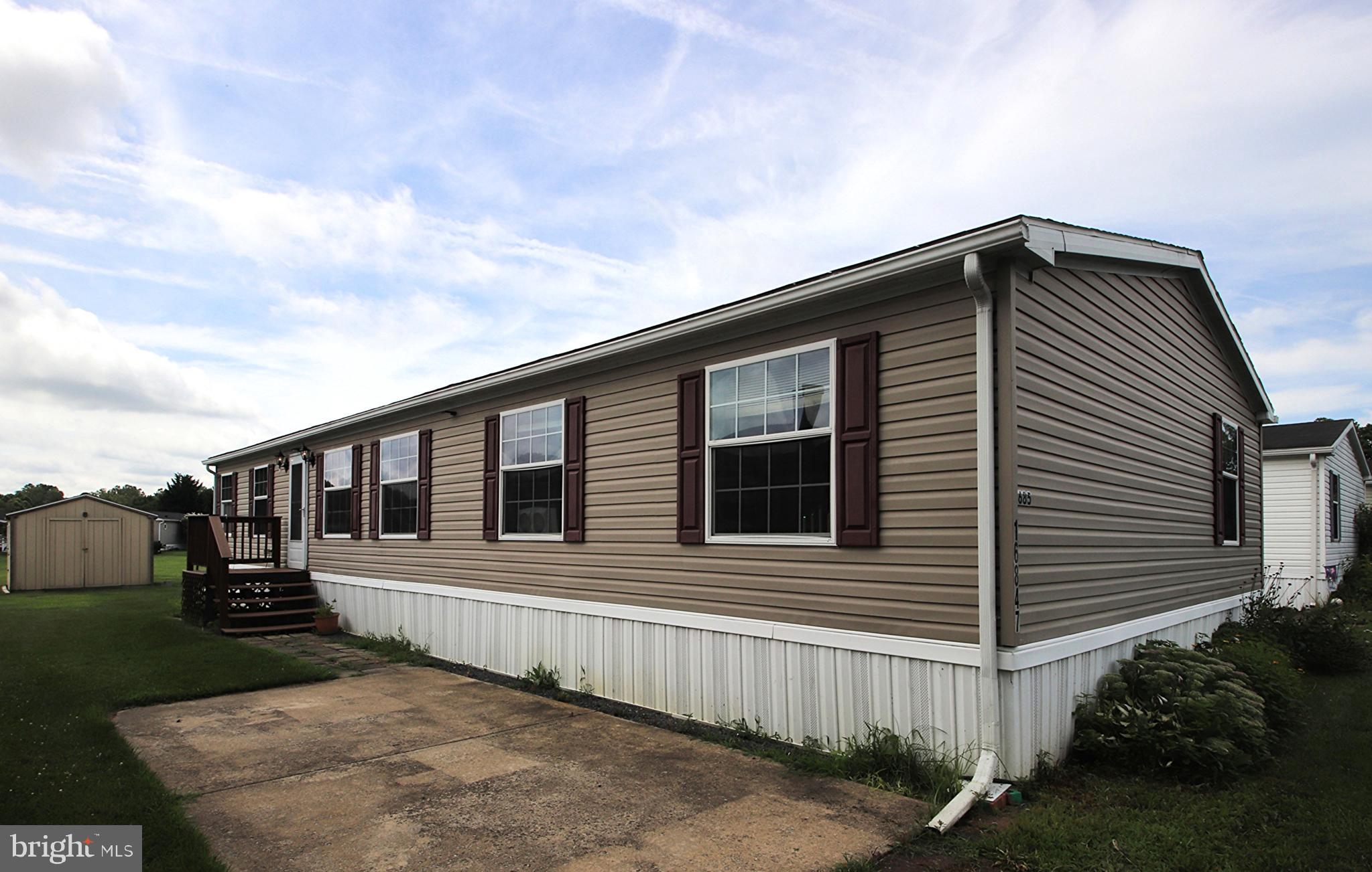 Lovely and spacious double-wide featuring 3 Bedrooms, 2 full Bathrooms, large Living Room, Kitchen with island, separate Dining Area, plus a Bonus Room that could be an office or second Living Room. HVAC system was recently upgraded to a heat pump reducing monthly utility bills! Monthly lot rent includes trash and snow removal plus there is a community pool! Convenient location close to shopping, restaurants, and interstate. Schedule your tour today!