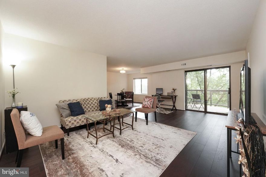 PRICE IMPROVEMENT!! 
Location, location, location! You'll love this bright and open 1208 sq ft 2 Bedroom / 1.5 Bathroom condo in located in the gated community of The Rotonda.   It comes with one reserved garage parking space on B1 (over $25K in value!) and a storage space on B2.   It is fully updated with $10s of $1,000s in beautiful finishes including NEW Hardwood floors (with a new subfloor), NEW HVAC, NEW Kitchen Appliances, NEW Bathroom tub, vanities, toilets, ceramic tile floors and fixtures, NEW Shades, NEW-er Washer and Dryer, updated kitchen cabinets and stone counter tops and more. 

Come enjoy the convenience of  this bright, spacious 2 bedroom condo in “The Boro” and all of the Amenities within your building!

You can access the club house through the garage of this building 8350!  The Rotonda offers superb amenities. Take advantage of 24-hour security, both outdoor and indoor pool with jacuzzi, sauna, onsite convenience store, tennis courts, basketball court, spa, volleyball court, 24-hour fitness room, game room, center, playground, dog park, party room, lounge.  The condo fee includes hot water, trash, sewer, all amenities. Unit owner only pays for internet and electricity which is typically around $75/month average! Walk to metro, walk to Whole Foods, Walk to Tyson's shopping center, walk to restaurants, banks and so much more!  AND.... the shuttle is back and running on regular intervals to the metro and close shopping highlights.

There is also a shuttle during limited times that is scheduled to start service again in early September.