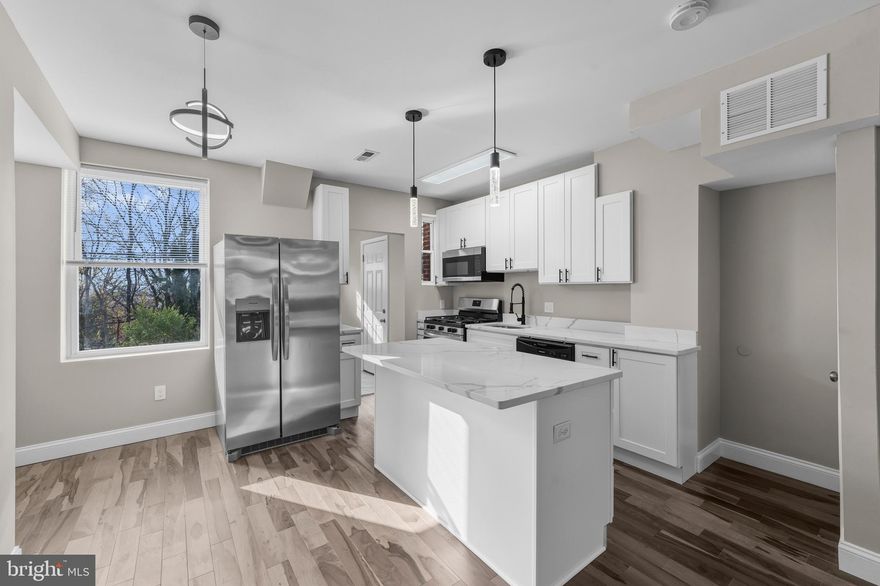 For Sale Only... Fully renovated 3-bedroom, 2-full bath home!  Kitchen is a standout—white cabinetry, stainless steel appliances, and a central island set the tone for effortless living and entertaining.
Located in a revitalizing corridor of East Baltimore, this home offers easy access to local amenities, major commuter routes, and nearby greenways. Monitored Alarm Included! This home qualifies for Vacant to Value funds from Baltimore City! Closing help available from Seller, up to $5,000!