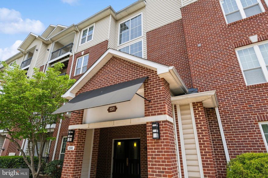 Bright & Beautiful Top-Floor Corner Unit in Prime Tysons Location. Experience elevated living in this sunlit 1BR/1BA corner unit, ideally located just minutes from the Silver Line Metro and the vibrant heart of Tysons Corner. Set in a secure building with elevator access, this top-floor home offers an airy layout with a cozy fireplace and access to a private balcony with serene views. The charming country-style kitchen opens to a spacious living and dining area, bathed in natural light. The bedroom offers generous space and a large closet. Enjoy the convenience of in-unit laundry, garage parking, and an additional reserved space. Stylish comfort in an unbeatable location! Assigned parking spot #122 in garage