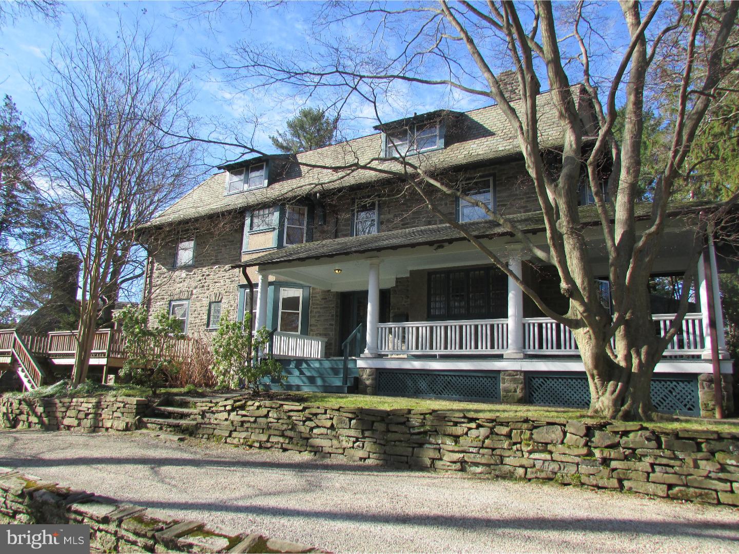 Location, location, location.  This Dutch Colonial stone twin was built in 1909. Designed by Architect Druckenmiller and Stackhouse, this large twin boasts 2,595 square feet and six bedrooms and two full baths.  The layout is perfect for entertaining with Arts and crafts style brick fireplaces on both first and second floors.  An open wrap around porch in the front is complemented by a large wrap around deck in the back with access from the Kitchen. There is a nice private yard in the back and a one car garage.  Situated in the heart of Chestnut Hill this house is very convenient to trains, shops, and surrounding Fairmount Park.  The bathroom on the second floor is brand new and the house has been completely updated with electric.  The outdoor space is the perfect spot to relax on a summers eve in Chestnut Hill.