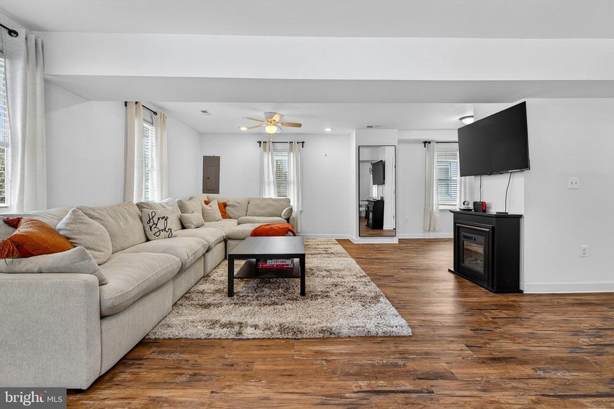 This gorgeous home is the perfect blend of classic charm and modern convenience on the peninsula of Sparrows Point! Meticulously renovated in 2023, this beautiful two-story home welcomes you with a large covered front porch and an open concept floor plan that seamlessly connects the living and dining areas—ideal for everyday living and entertaining. The gorgeous new kitchen shines with stainless steel appliances, crisp white cabinetry, and granite countertops.  Convenience is key with a  main-level powder room. Upstairs, you’ll find a spacious, updated primary bedroom with a private ensuite, two additional generous bedrooms, and an updated hall bath featuring a double vanity and linen closet. Additional updates include a heat pump and water heater (2023), replacement windows (2021), and a new roof and siding (2021). Outside, enjoy a partially fenced yard and patio area for entertaining.  An unbeatable location just blocks from local restaurants, shopping, schools,  and Haul Road/trails to North Point State Park.  Water oriented community - approximately  8–10 blocks from the Back River.   Easy access to I-695. This is Sparrows Point living at its best.  [This property appraised for $380,000 when Seller purchased in 2024.]