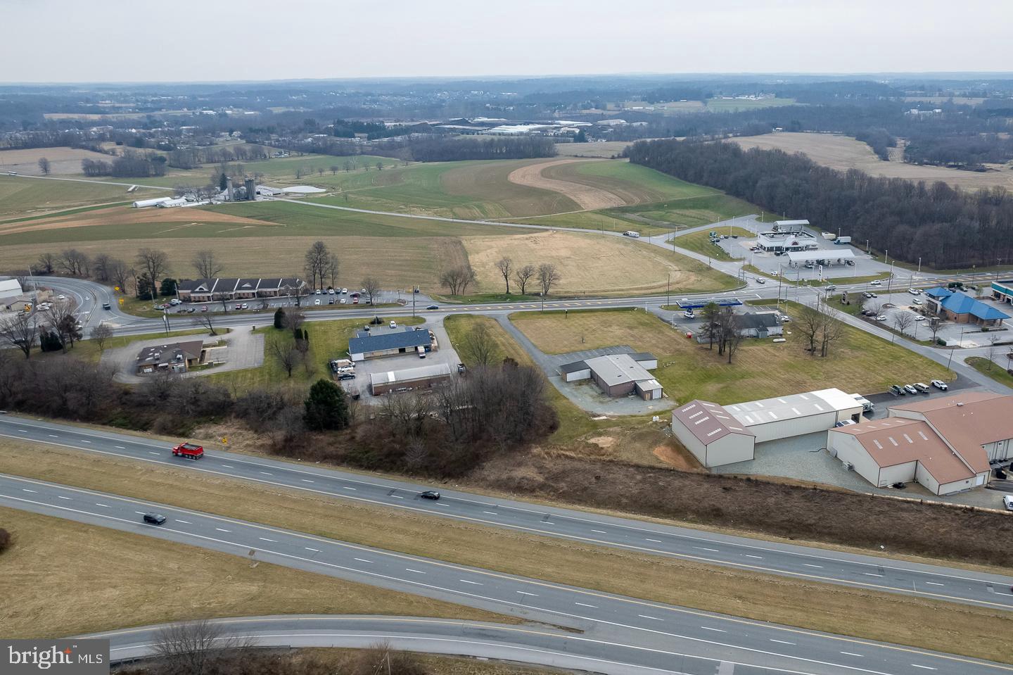 US RT 1 and Rt 10 interchange. 2.1 acre +/- site available for commercial use. Approximately 300' From Route 1 Bypass Ramps. Excellent visibility & traffic count. property situated on route to Walmart shopping center. Commercial Building has many possibilities as well. 4600 S.F. steel structure, 2 Heat Pumps. . Route 10 Road Frontage Is 175'. Public Sewer, on site well. Opportunity to lease or purchase.
