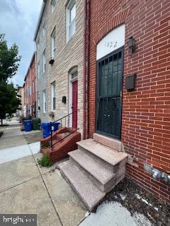 Don’t miss this exceptional investment opportunity just steps from Patterson Park in the heart of Upper Fells Point! This charming rowhome offers three finished levels of living space and is bursting with potential. The main level features hardwood flooring throughout the spacious living and dining areas, a convenient powder room, linen closet, and laundry area. The kitchen is filled with natural light and offers ample cabinet space, plus room for a kitchen table.
Upstairs, the second level includes a generously sized primary bedroom with a ceiling fan, a second bedroom, and a full bathroom. The third level adds even more flexibility with a third bedroom and a bonus room—perfect for a fourth bedroom, home office, or creative space.
The backyard has plenty of potential with a screened-in porch and a backyard with plenty of space to garden, relax, or entertain. Located just blocks from Patterson Park and some of Baltimore’s best local restaurants, shops, and attractions, this home is full of possibility in one of the city’s most sought-after neighborhoods!