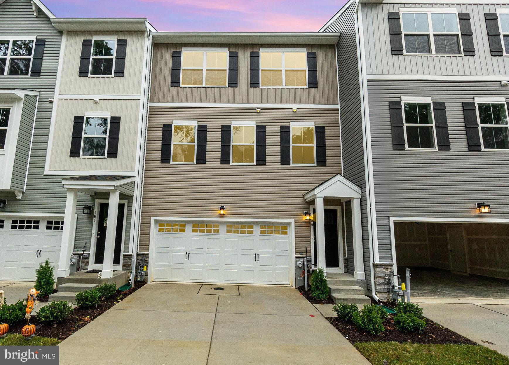 2YR OLD 3 LEVEL TOWNHOME WITH 2 CAR GARAGE & PRIVATE DRIVEWAY! Welcome home to this stunning Craftsmen style home featuring 3 bedrooms, 2-1/2 baths, upper level laundry, and full primary suite. The kitchen is a chef's dream w/a gorgeous extra large island, quartz counter tops, all new stainless steel appliances, walk-in pantry, luxury vinyl flooring and recess lighting. Enjoy the main level open concept complete with a spacious living rm, dining area, and half bath. The upper level boasts a primary suite with 2 French door closets, ceiling fan, and an on-suite w/double sink vanity, walk-in shower, and ceramic tile flooring. Spacious 2nd & 3rd bedroom share an ample size hall full bath with ceramic tile flooring and shower/tub combination. The lower level includes garage access & plenty of storage/gym space with a door leading to rear yard. Be the 1st to live in this well appointed home, located on a cul-de-sac, in Patterson Mill School District, and in close proximate to shopping, town amenities, and I-95. This one is a must see!