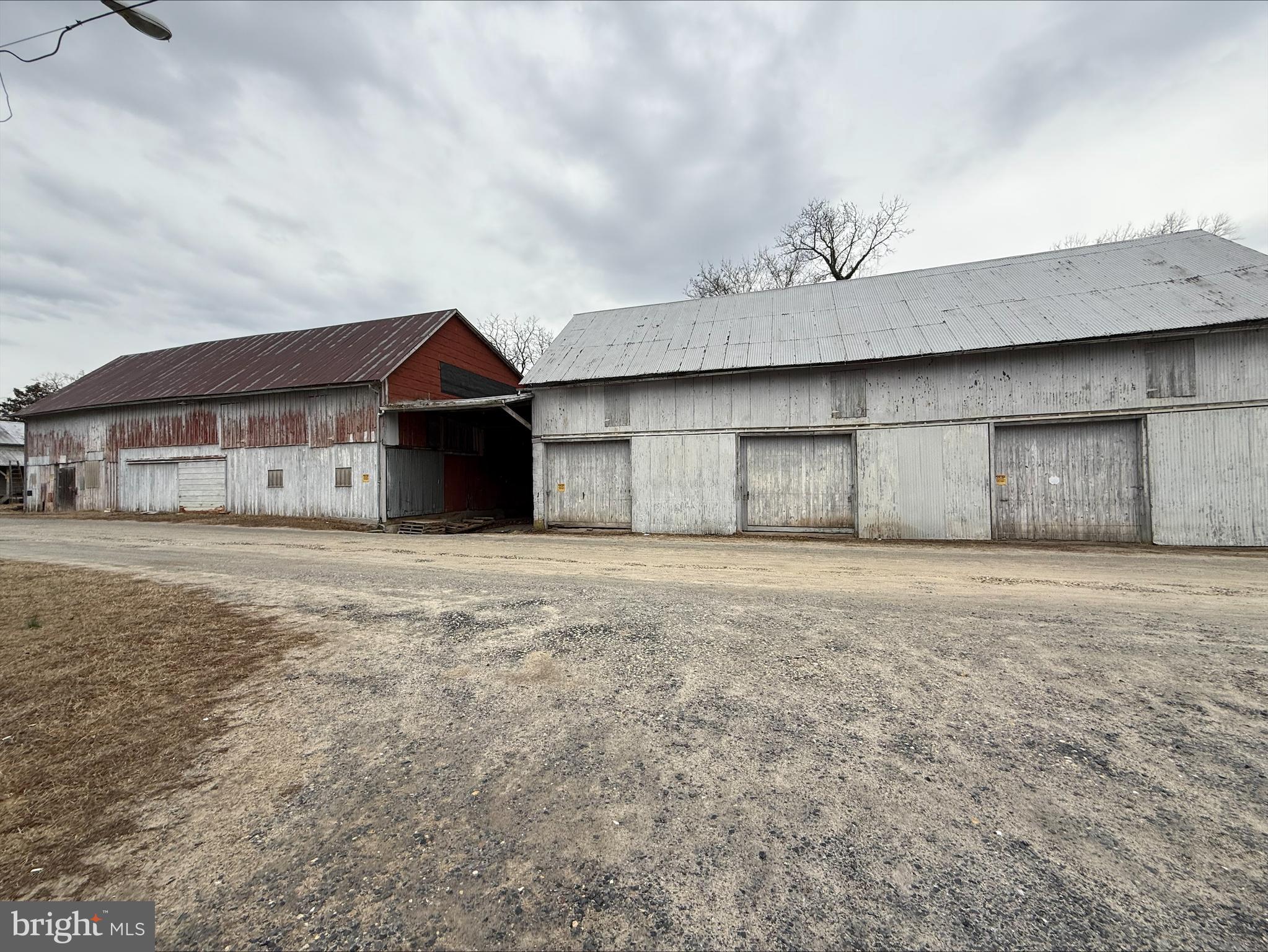 Large warehouse and storage barn on an expansive 2-ACRE lot on Davis Lane, a no-through street steps to Marshyhope Creek near Downtown Federalsburg - Public Water & Sewer on the street. Tax ID 05-004616. Centrally located in Caroliine County on Maryland's Eastern Shore. Minutes to public parks, marinas. 10-15 minutes to Seaford or Bridgeville, Delaware, Sharptown, MD. 30 minutes to historic Downtown Cambridge. Sizes, taxes, distances are approximate. Owners are licensed realtors in the State of Maryland.