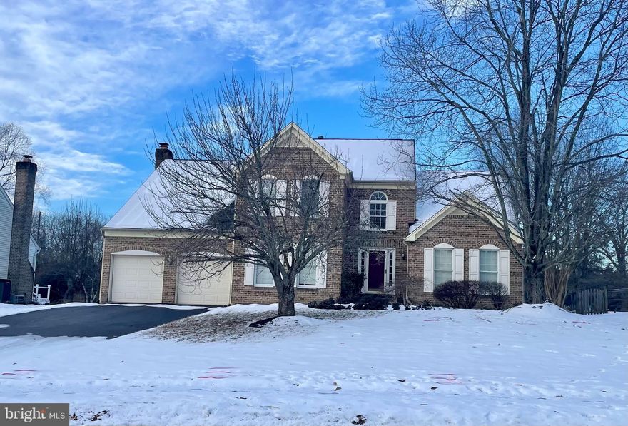 ** Open Houses: Saturday, 2/1, 11:00 AM - 1:00 PM; Sunday, 2/2, 12:00 PM - 2:00 PM. **  Welcome to Virginia Run's Pleasant Hill neighborhood! This is a beautiful Raleigh model offers a stately 2-story foyer with generous area for greeting your guests. The main level features a vaulted ceiling in the living room, beautiful crown and chair moldings and bump out with windows in the dining room, and hardwood flooring throughout the formal living areas and office. The office includes French doors, a private entry to the main-level full bathroom, and closet, making it ideal for use as a bedroom if needed. The heart of the home is the spacious eat-in kitchen, which boasts a wall of casement windows, a desk area, wet bar, kitchen island bar, and stainless steel appliances, including a double wall oven and Sub-Zero 5-burner gas range. There's plenty of room for a kitchen table. Step down into the family room, which features a bay window, wood-burning fireplace, and access to the rear deck and fenced yard. The laundry room is conveniently located just off the kitchen, providing access to the oversized attached garage.  The generous primary suite includes a cathedral ceiling, huge closets, and an en-suite bathroom with a soaking tub, walk-in shower, and dual sink vanity. Bedrooms 2, 3, and 4 are spacious and share an updated full bathroom. The finished basement open rec room is perfect for gaming, movies, or a play space. The den could serve as an exercise room or an NTC bedroom. There is also a full bathroom with a tub/shower combination. The storage/utility room offers plenty of space for storage and even includes a cedar closet. ***Utilities: 2016 gas 70-gallon water heater. Dual-zone HVAC: upper-level heat pump; main and lower-level forced air furnace and AC (dates unknown but believed to be less than 10 years old). Zoned for top FCPS schools: Westfield High School, Stone Middle School, and Virginia Run Elementary School. Enjoy the Virginia Run amenities, including the James McDonald Recreation Center, which offers a pool, tennis and pickleball courts, tot lots, and trails. Trash and recycling are included with your low $90/month HOA fee.