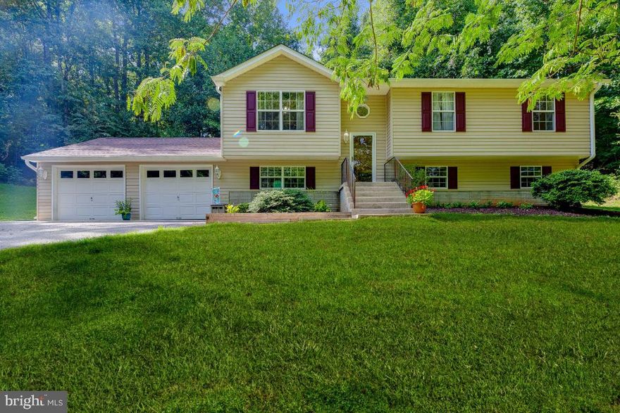 Don't miss this one!  2+ PRIVATE acres of the beautiful great outdoors surround this updated and well maintained and updated 4 bedroom/3 bathroom split foyer.  Come sip your coffee on the enclosed back porch, with nothing but nature as far as the eye can see!   This is not your average 2 acre lot -- situated on a beautiful hill in the forest, there's plenty of area for exploring, hiking, 4-wheeling/dirt biking -- Feeling adventurous? There may even be a good spot for a tree stand back there.  Not only are the outdoors unique, the freshly updated Counter tops, stainless steel appliances, updated flooring and fresh paint --make this home ready to move right in!    Roof, shutters, gutters and down spouts all replaced in 2019.  Come see it before its sold!