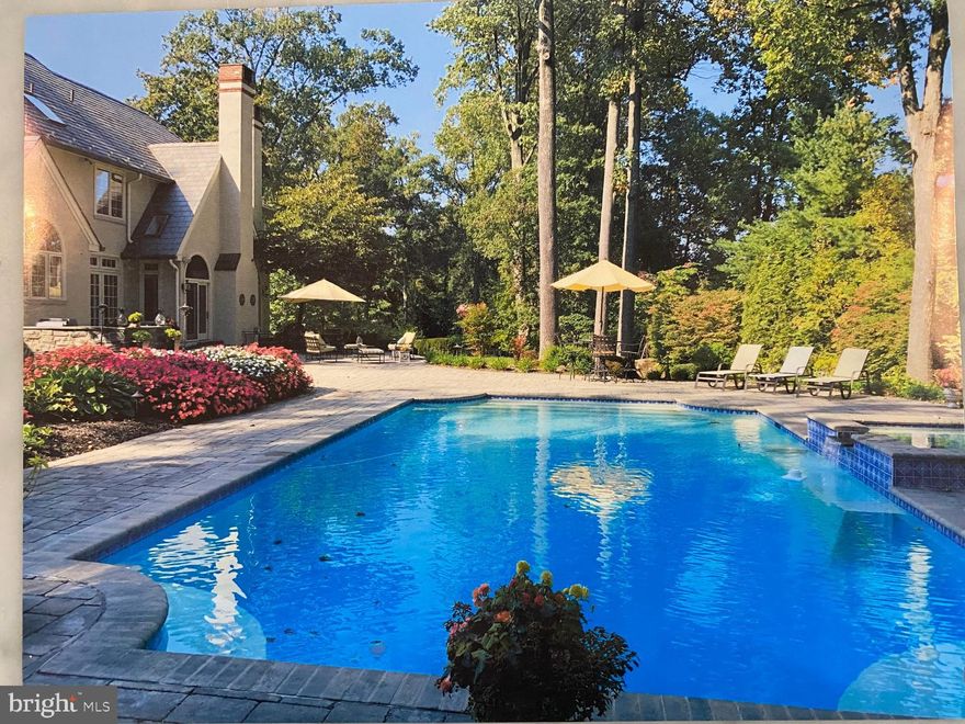 DREAMING of this backyard oasis?? Well your dreams may just come true, as  Understated elegance abounds from every square inch of this absolutely STUNNING property from inside to out, in the beautiful neighborhood of  D'Orsay . This lovely enclave of 17 custom homes is quietly nestled in the estate section of Devon, and this property's cul-de-sac's prime location has one of the best lots in the development.  From the moment you approach one can feel a sense of sophistication, as this brick masterpiece with slate roof is beautifully surrounded by one acre of extensive landscaping.  A magnificent two story Foyer sets the tone for this exquisitely decorated home by Barbara Bolongue that opens into the formal and informal rooms. Magnificent floor-to-ceiling Pella  windows provide sunlight that naturally floods the First Floor, while gleaming hardwood floors create a seamless transition between the formal and informal spaces. Flanking the Foyer are the Living and Dining Rooms that are an entertainers dream with luxurious finishes such as a coffered ceiling, extensive millwork and gas burning fireplace. The traditional floor plan flows into the family friendly area of the home where you will find open spaces directly connecting the sunken Family Room,  Breakfast Room and gourmet Kitchen.  Recent renovations of the Family Room include a striking wood burning fireplace with custom cabinetry concealing a flat screen tv, and the attention to detail continues with many custom built-ins. Cooking in the newly renovated Kitchen by Peterson will be a true pleasure, while enjoying high end state-of- the-art appliances, large island, granite countertops, and gorgeous cabinetry. Your entertaining needs and wants are completed by a Wet Bar that is conveniently located between the Kitchen and Dining Rooms. A Mudroom, walk-in Pantry, Laundry Room and informal Powder Room  adjoin  the Kitchen and grant access to the expanded  2 car Garage. On the opposite side of this family friendly oasis  a cozy and private  Office with floor-to-celling wood paneling and gas fireplace can be found, while the First Floor is completed by a stunning  formal Powder Room. The most exquisite Master Suite awaits  you at the top of the Second Floor with a brand new spa-like Bathroom  and custom walk-in closet fit for a king and queen. There are  a Two additional Bedrooms serviced by a spectacular Jack and Jill Bath.  A Fourth en-suite  Bedroom has a renovated Bathroom that also services the very large Fifth Bedroom above the Garage. The walk-out Lower Level is finished with a private room that can be used as an additional Office,  there is a Theatre Room,  a Playroom, and  plenty of storage. The amazing amenities of this move-in ready, meticulously maintained and renovated  home continue outside where a backyard paradise can be found with extensive hardscaping, outside kitchen, and magnificent Wolf pool.  Life is not good... but GREAT at 605 Longchamps offering a extraordinary lifestyle in one of Radnor Townships most sought after neighborhoods!! Don't miss this extra special  gem both inside and out!!! ALL SHOWINGS BEGIN ON SATURDAY MARCH 6th!!   Please note that Delaware County is conducting a real estate tax reassessment, effective January 1, 2021 The tax information reported in the multiple listing service is provided from records which may not have updated and may be incorrect. If you have any questions or concerns about the real estate taxes for this property, you should contact the Delaware County Treasurer's Office or call the Tax Reassessment Hotline at 610-891-5695.