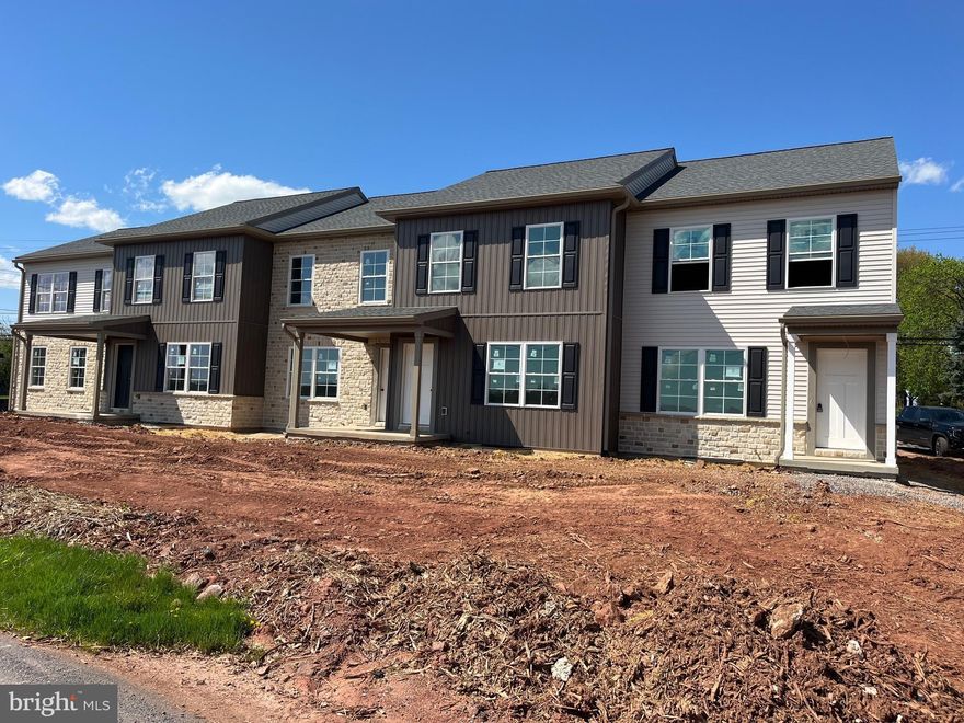 5 Brand new townhouse apartments under construction. All 3 Bdrm, 1.5 baths, eat in kitchen, Lv. Rm, front porches, rear porch, full basement with, sprinkle systems, All plank flooring except Bedrooms, All appliances included (except W/D ) 6 car detached garage with 4 inside storage units, New well installed with 50 gallon minute plenty of water, public sewer, It will be a new paved parking lot with plenty of parking.  August settlement date.