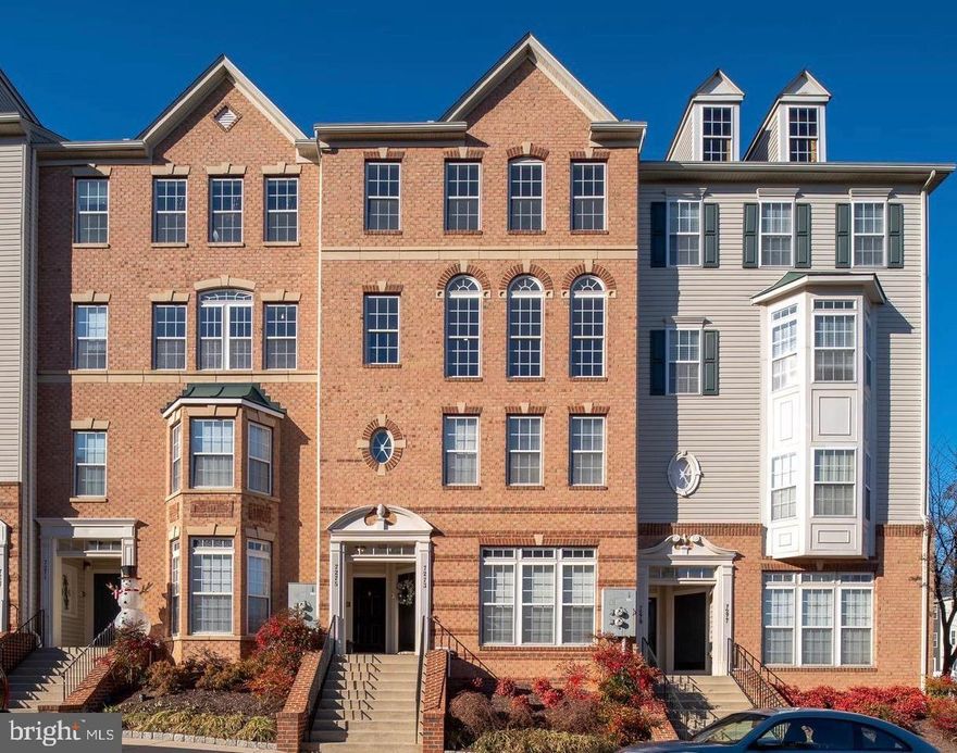 Stunning, renovated 3BR/2.5BA townhome-style condo with 2,600 sq. ft. of modern luxury in prime Howard County location. Discover a rare blend of space, style, and sophistication in this beautifully reimagined two-story condo—a standout home that lives large and delivers every modern comfort. Step inside to soaring 9-foot ceilings and an oversized living and dining room bathed in southern light from a dramatic wall of Palladian-style windows. Plush, newer “greige” colored carpeting and recessed lighting create an inviting, contemporary ambiance, perfect for hosting or relaxing. At the heart of the main level is a fully renovated designer kitchen that will impress even the most discerning cook. Enjoy brand-new 40 inch white shaker cabinets, quartz countertops, stainless steel appliances, a 5-burner gas range with griddle, deep single-basin sink, and a large, reimagined counter-height island that opens the space and provides generous seating. A spacious pantry closet, new recessed lighting, stylish island pendants, and durable LVP flooring complete the look. The spacious breakfast nook, illuminated by a modern-farmhouse chandelier, features French doors that open to a private balcony—the perfect place to enjoy your morning coffee. Open to the kitchen is a spacious family room enhanced with fresh recessed lighting and a sleek, updated ceiling fan. A chic powder room with LVP flooring and large storage closet round out the main level. Upstairs, retreat to a luxurious primary suite featuring a tray ceiling with cove lighting, plush carpeting, modern ceiling fan, and two spacious walk-in closets. The spa-inspired en-suite bath offers dual updated vanities with quartz counters, abundant storage, and black fixtures. Indulge and unwind in a luxurious brand new and never-used dual shower-head walk-in glass shower, finished with crisp white subway tile and stylish hexagon mosaic flooring. The en-suite also has a toilet and linen closet. Bedrooms 2 and 3 are generously sized with soft carpeting, while the updated hall bath showcases an upgraded double quartz-topped vanity, sleek black hardware, LVP floors, and a shower/tub combo. The renovated upper-level laundry room is a homeowner’s dream—complete with built-in cabinetry, quartz-topped folding station, tons of drawers for storage, LVP flooring, and newer, state-of-the-art full-size front-loading washer and dryer. White faux-wood blinds provide style, privacy, and consistency in every space throughout the home. 
Enjoy turnkey convenience with included smart-home essentials like a Nest thermostat, ADT alarm system with exterior camera, and Google doorbell. A 1-car garage and private driveway adds convenience, while the community offers a walking path to Elkridge Elementary and Elkridge Landing Middle School. This home is also zoned for the brand-new Guilford Park High School, offering state-of-the-art facilities and a cutting-edge learning environment. Enjoy an easy stroll to groceries, pharmacies, and restaurants, plus quick access to Columbia Town Center and the vibrant new Merriweather District. Commuters will love being moments from Rt. 100 & I-95, with fast connections to Baltimore, Ft. Meade, NSA, Washington, D.C., and BWI Airport (less than 10 minutes). With every upgrade already done and every detail dialed in, all that’s left is for you to turn the key. Schedule your tour and experience the lifestyle you’ve been waiting for.