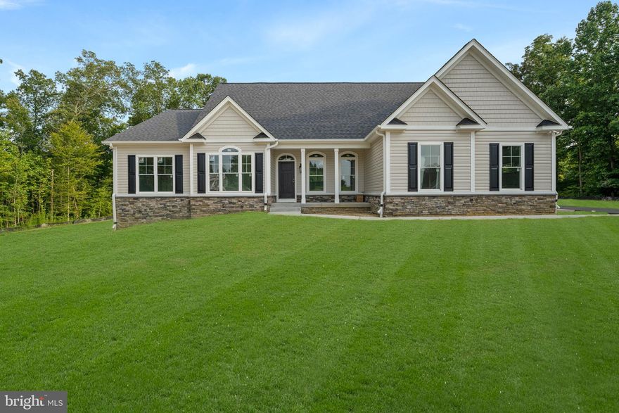 Adorable Custom WILKERSON Homes Rambler!  4 Bedroom; 2.5 Bathroom with unfinished basement.  One Acre Lot Surrounded by Forest Conservation!  Many One Acre Lots to choose from!!  Wilkerson Homes is Truly a 100% CUSTOM BUILDER!  NO limit to changes; NO Change Orders; WILKERSON FEATURES/STANDARDS AND ALLOWANCES INCLUDED in this Price!  FEATURES and STANDARDS INCLUDE Appliances, Kitchen Cabinetry, Granite Counters, Custom Kitchen Design, Flooring, Lighting, and the list goes on!! Rounded Corners, Craftman Doors with Levers, STONE Gas Fireplace with STONE MANTLE or Customized Wood Mantle, Stone Front Watertable, Hardwood Foyer, Ceramic Tile Floors in Primary Suite (YOU choose the tile), Tile Shower Surround (YOU choose the tile), Soaking Tub with Tile Surround (YOU choose the tile), 9' Ceilings, Crown Molding in Foyer, Crown Molding in Dining, Crown Molding and Tray Ceiling in Primary Suite, Unfinished Basement to include 3 Piece Rough In...DID I MENTION $12k in Seller Contribution with use of preferred lender and settlement office?  Build On Your Own Lot!!  Your plan OR Ours!!  Welcome Home to Wilkerson!  Call me TODAY to begin your CUSTOM DREAM HOME!!