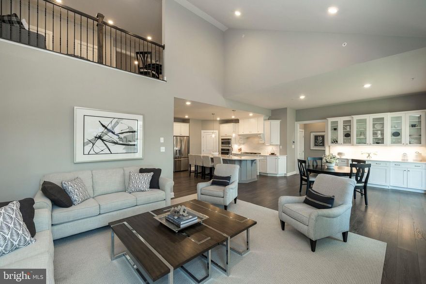 Only 2 homesites remain at Wayne Glen by NV Homes! Don't miss the opportunity to live in the only new luxury home community in Wayne with low-maintenance lifestyle, walkable to KOP Town Center, and in Tredyffrin Schools. The BRYN MAWR home is designed to offer you the convenience of a first-floor living plan that suits your lifestyle. Upon your entry, the foyer opens to an elegant dining room on the left and, to the right, a guest bedroom and full bath. Just beyond, you'll find a formal study with beautiful French doors and transom.  An enormous great room makes entertaining effortless, and it's open to the gourmet kitchen so that you never miss a moment.  You'll also love the other luxury upgrades, like 5" hardwood floors and CushionClose cabinetry!  Adding the optional morning room will give you even more room to entertain or a place to enjoy your coffee or tea and your favorite book. The owner's suite is set apart, yet still convenient to the rest of the house, and features a spa-like owner's bath with soaking tub, separate shower, dual vanities and a compartmentalized water closet. Or, you can upgrade to a Roman shower to enhance the feeling of being at a private resort. Adding a luxurious look, the owner's bedroom also includes a tray ceiling.  The laundry room is conveniently located just off of the two-car garage, just a few steps from the owner's bedroom. On the second floor, there is a loft, spacious bedroom and full bath - plus, a bonus storage/office space.  In the included expansive finished basement with a fully finished bathroom, imagine your years of enjoyment as a media room, play area, home gym, and more! The Bryn Mawr offers well-appointed exterior details including Hardi Plank siding, natural stone, and bluestone walkways.  Photos are representative.  NVHomes is taking precautionary measures to protect our valued customers and employees.  Our models are open by appointment.