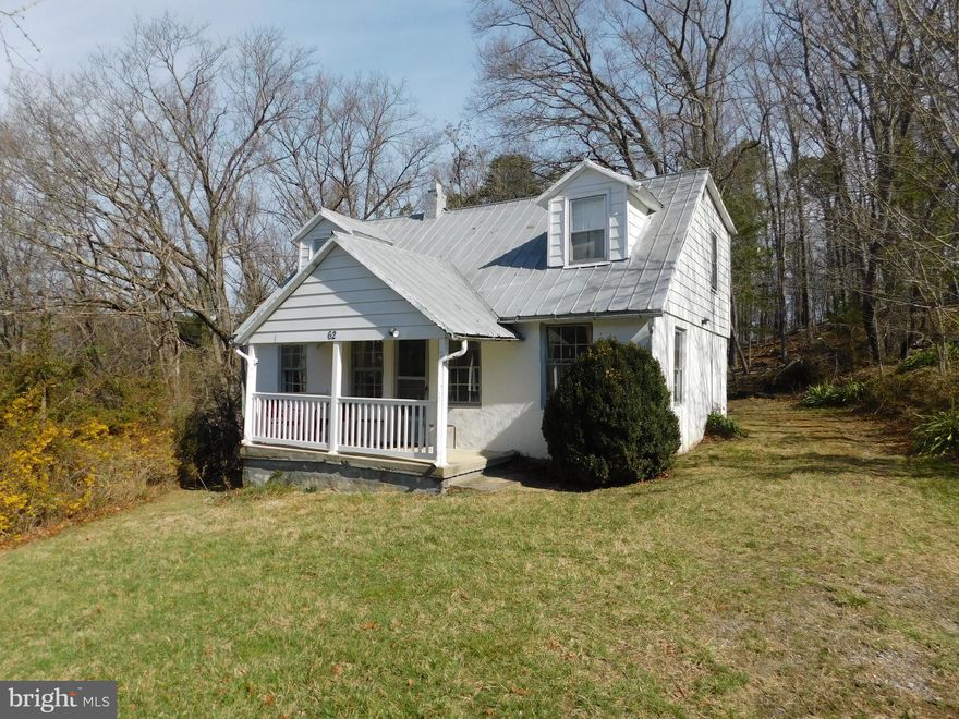 Awesome investment opportunity!! Fully furnished cottage located 1 mile from Bentonville public boat access. Hardwood floors have been refinished and some repair work has been completed on the rear porch.  This cozy cottage could be the perfect STR investment or weekend getaway and is located on a partially wooded lot that backs up to public lands. Enjoy all the amenities of the river without the camping! This property has a cistern that is fully enclosed and is filled by water delivery not a guttered rain fall system. The original oil furnace has been disconnected and the house relies on alternative heat source.  All furnishing convey with the exception of the twin bed in the upstairs bedroom Bring your creativity and your kayaks and enjoy the summer "on the river"! Sold as is