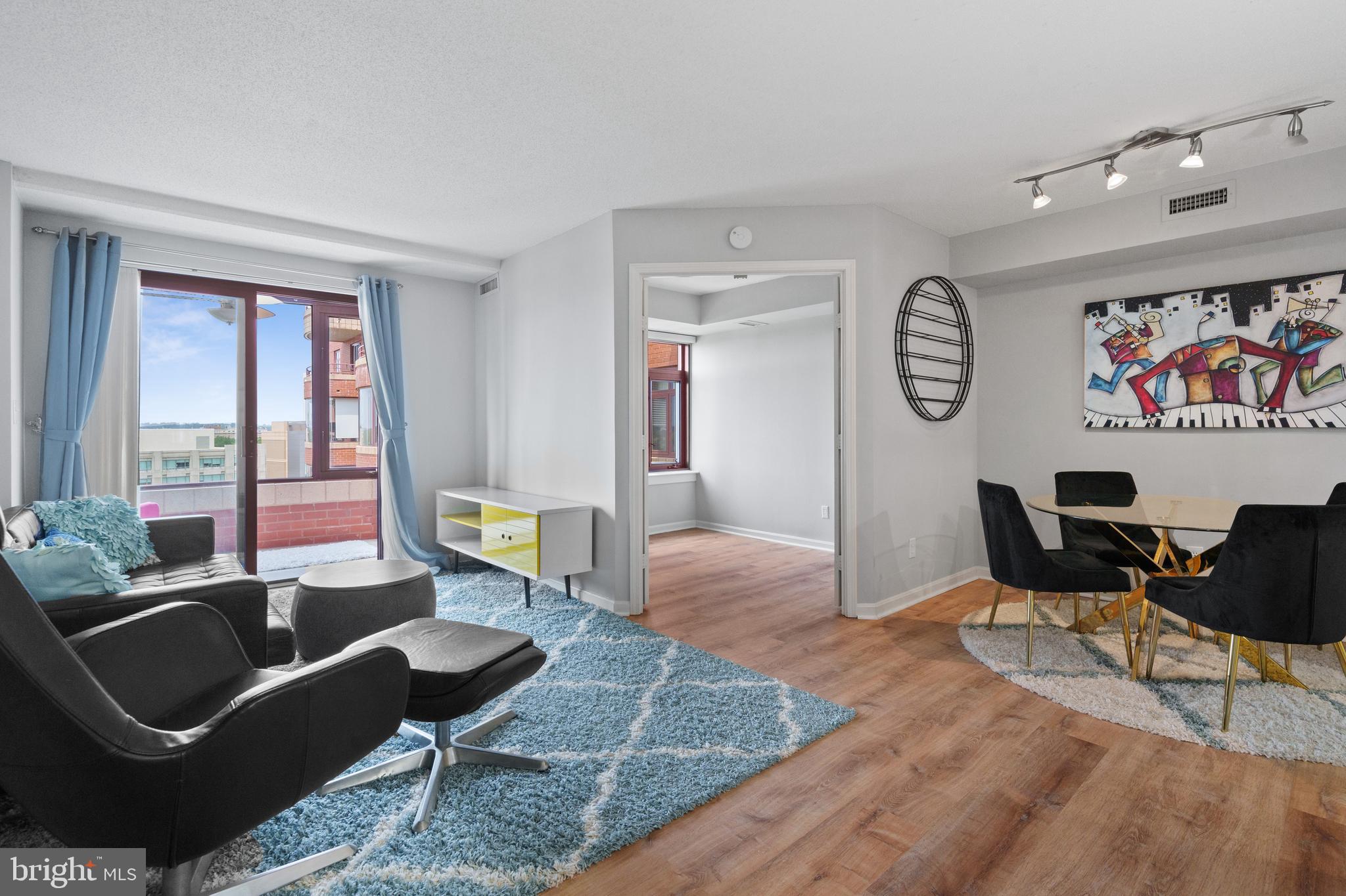 Enjoy vibrant urban living in this spacious one bedroom and a den, one-and-a-half-bath condo at The Charleston—just two blocks from Courthouse Metro (Orange & Silver Lines) and moments from Clarendon’s popular dining, shopping, and entertainment options.
This light-filled home features wood floors throughout, a well-designed kitchen with generous cabinet space, and the convenience of an in-unit washer and dryer. The open-concept living and dining area flows seamlessly into a spacious enclosed balcony—ideal for a reading nook, workout area, or a bright and quiet home office.
Additional features include a premier assigned garage parking space (Spot #12) and a separate storage unit. Community amenities include a concierge, swimming pool, and fitness center.
Condo fee includes most utilities, and electricity is $44/ month. Building amenities include a private pool, gym, concierge, elevators, and guest parking.
Situated between the Courthouse and Clarendon neighborhoods, this location offers easy access to parks, public green spaces, local markets, and everyday essentials. With Whole Foods, Starbucks, and Metro access just steps away, this condo offers a smart combination of space, comfort, and convenience in one of Arlington’s most connected communities. *available furnished too*
