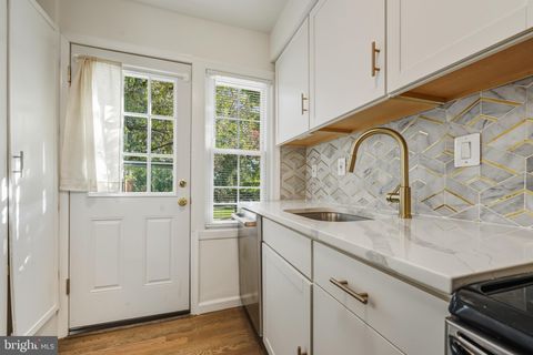 Photo of 2110 Suitland Terrace SE, WASHINGTON, DC 20020 (MLS # DCDC2229092)