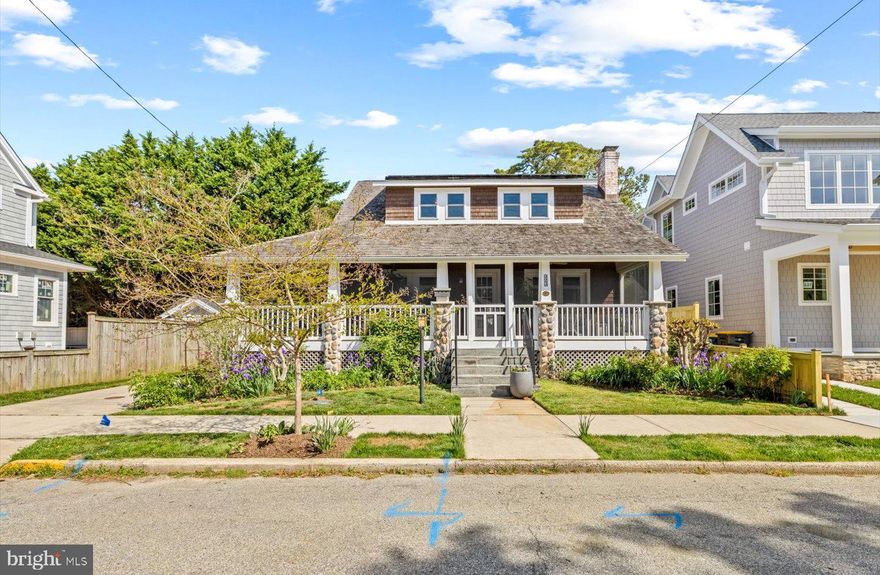 Nestled on one of South Rehoboth’s most charming and sought-after streets, 223 Rodney Street is a rare offering that seamlessly blends timeless coastal character with modern luxury. Originally built in 1927, this classic Rehoboth cottage was thoughtfully and completely renovated in 2016, preserving its historic charm while introducing today’s most desirable features. This spacious home offers 5 bedrooms and 4.5 baths, including dual primary suites on both the first and second floors—ideal for flexible living and hosting guests. Inside, you’ll find beautiful hardwood floors throughout, a cozy fireplace, and an open, inviting layout designed for both relaxation and entertaining. The updated kitchen is a true centerpiece, featuring high-end stainless steel appliances including a gas range, quartz countertops, a stylish tile backsplash, a large center island, and beautifully crafted cabinetry. Outdoor living is just as exceptional, with a welcoming front screened porch, a private rear deck, and a lushly landscaped backyard that offers both beauty and seclusion. Additional highlights include an outdoor shower, perfect after a day at the beach, and a detached garage providing space for one car plus ample storage for beach gear. Topped with a cedar shake roof that enhances its coastal appeal, the home also features an owned solar panel system for added energy efficiency. All of this is just a short stroll to Rehoboth Avenue, the boardwalk, shops, dining, and the beach—making this an extraordinary opportunity to own a piece of Rehoboth’s history in an unbeatable location.