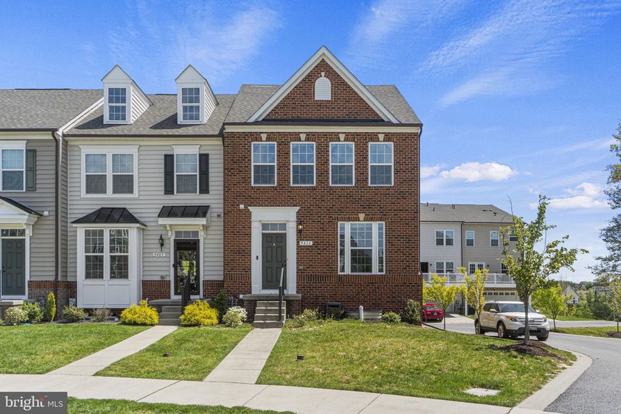 **Any & All offers are due on Tuesday 5/7 by noon**Welcome to this beautiful 3 bedroom 2 full & 2 half bath end unit town home in the sought after Ballard Greens subdivision of Owings Mills. This light filled home draws you in with its open floor concept and gorgeous hardwood floors. The heart of the home awaits in the gourmet kitchen, where culinary enthusiasts will delight in stainless steel appliances, gas cooking, granite counters & island with stylish cabinetry. Whether you're preparing a casual meal or hosting a lavish dinner party, this kitchen is sure to impress. High ceilings with recess lights just pulls in the natural light. The open concept allows you to furnish and setup however you like allowing for a dining area, extra breakfast nook, and large yet cozy living space. The top level has NEW  CARPET with 3 spacious bedrooms, 2 full baths, along with the laundry room. Retreat to the primary suite oasis boasting trey ceilings, en-suite bath, and a massive walk in closet with custom built in organizers. The primary bath has dual vanities, separate tub, and separate shower. The lower level has a dry bar with mini fridge, simply ideal for entertaining along with another powder room.  Huge trex deck off of the kitchen perfect for outdoor grilling or just soaking in the sun.  2 car garage* Ideally located near shops, restaurants with access to public transportation and 795. This is simply one not to miss!