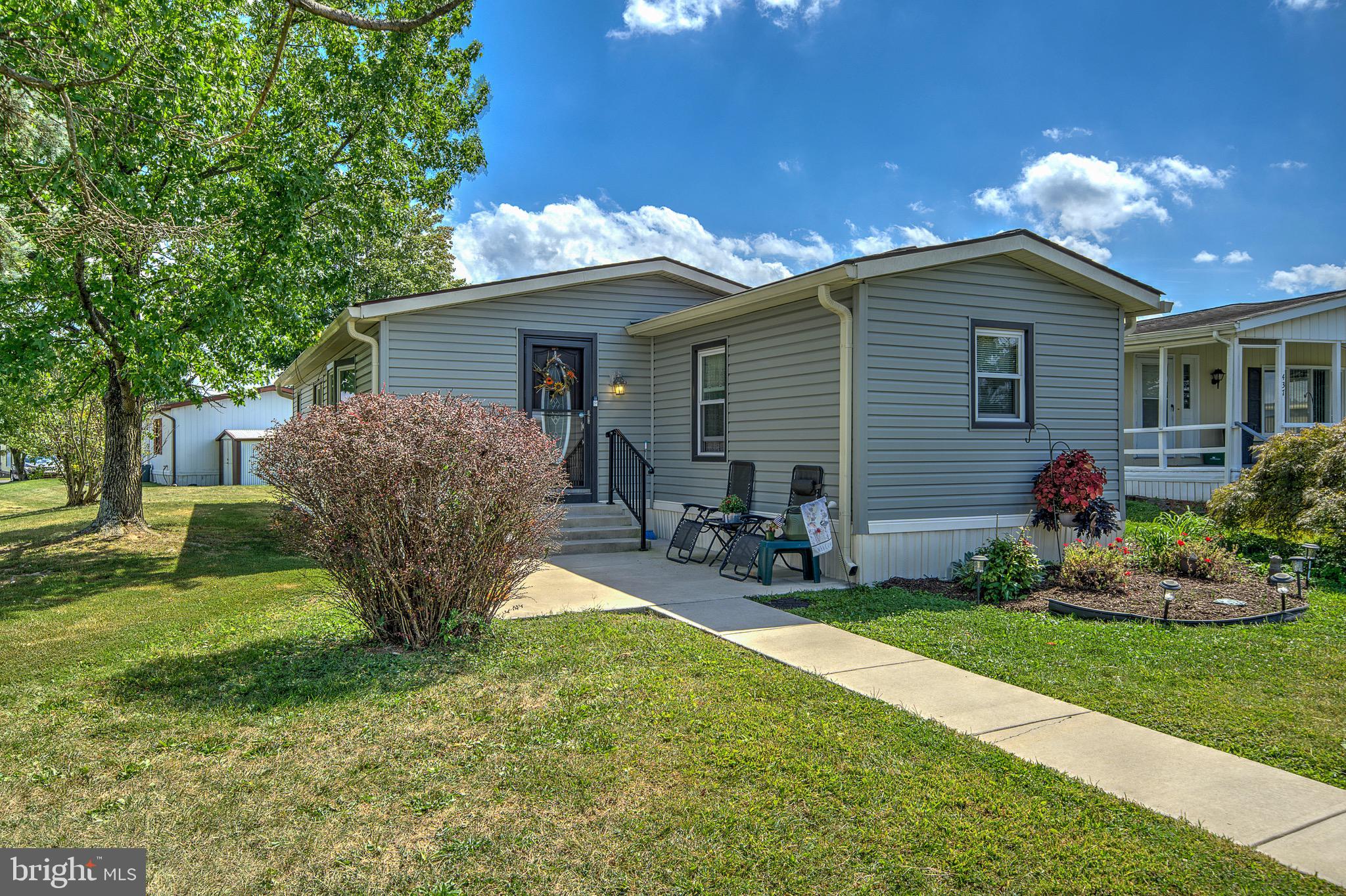 Now Available in the 55+ Village of Neshaminy Falls!
The home you've been waiting for is finally on the market!
Enjoy the ease of two conveniently located parking spaces and a short path leading to your brand-new concrete patio — perfect for relaxing or entertaining guests.
Step inside to find a spacious, sun-filled living area with soaring two-story ceilings and updated flooring. Just off the living room, you'll discover a separate formal dining space and a versatile bonus room that can serve as a cozy family room or private office — the choice is yours.
The eat-in kitchen features brand-new flooring and plenty of space for casual dining. This home offers two generously sized bedrooms and two beautifully upgraded bathrooms. You'll also appreciate the dedicated laundry room and additional outdoor storage, complete with a shed.
Recent Upgrades Include:
Concrete patio & walkway (2021)
Windows, siding, gutters, skirting, and leaf guards (2018)
Main bathroom remodel (2018)
All interior & exterior doors (2017)
HVAC system (2021 & 2025)
Don’t miss this well-maintained, move-in-ready home in the desirable Neshaminy Falls community!