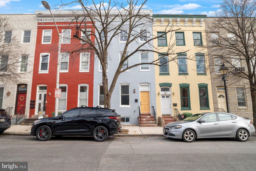 Welcome to 25 S. Calhoun Street, a masterfully renovated townhome nestled in the heart of Baltimore's historic Union Square neighborhood. This exquisite residence seamlessly blends timeless charm with modern luxury, offering an unparalleled living experience.

As you step inside, you're greeted by an expansive open floor plan that exudes warmth and sophistication. The main level boasts gleaming hardwood floors and thoughtfully designed accent walls that add a touch of contemporary flair. The gourmet kitchen is a chef's dream, featuring pristine marble countertops, sleek black fixtures, and top-of-the-line stainless steel appliances.

This spacious home offers five generously sized bedrooms, each bathed in natural light and designed for comfort. The newly finished basement provides a versatile space that can serve as a sixth bedroom or a private office, catering to your lifestyle needs. With four and a half elegantly appointed bathrooms, including spa-like features and modern finishes, every detail has been carefully curated to ensure luxury and convenience.

Beyond the beauty of the home itself, 25 S. Calhoun Street is situated in a vibrant community rich in history and culture. Union Square Park, a block-sized oasis with an ornate fountain and Greek Revival pavilion, offers a serene escape just steps from your door. Nearby, the historic Hollins Market, the city's oldest market building dating back to 1838.

Experience the perfect harmony of historic elegance and modern amenities in this remarkable townhome. Don't miss the opportunity to make 25 S. Calhoun Street your new sanctuary in the city.

Please note in a select few of the photos provided, the furniture and décor shown are digitally staged for aid with vision and do not reflect the actual furnishings in the property.