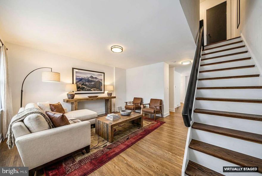 Welcome to 354 Krams Street, a 3-bedroom, 1.5-bath Manayunk charmer with PARKING that actually lives up to the hype. The classic brick façade and front porch are ready for container gardens, a rocking chair, or whatever seasonal décor mood you’re in.
Inside, a spacious open living room easily fits a sectional (or your treasured heirloom sofa) with room to spare. Sunlight pours in, keeping the space bright, warm, and plant-approved. Just beyond, a conveniently placed powder room and linen closet make hosting easy and low-stress, exactly how it should be.
A separate dining area sets the stage for cozy dinners and lively gatherings, while the efficient galley kitchen keeps everything within arm’s reach. Host the dinner party you’ve been dreaming of.. Glance out the rear windows and watch guests arrive and park… Yes, park comfortably. With your own GARAGE, DRIVEWAY, additional paved PARKING, and plentiful street parking, having guests over might become a habit.
Upstairs, three well proportioned bedrooms gives everyone their own space to unwind. A hallway closet keeps things tidy, and the skylit three-piece bathroom feels fresh and airy with natural light streaming in.
The lower level offers flexible bonus space for a home gym, storage, or a proudly curated Philly sports shrine. Laundry is conveniently located along the path to the rear parking, making everyday life just a bit easier. Out back, enjoy an extra yard area that can stay open for parking or be gated for a safe doggo / play zone. Yes, there’s room for a proper game of fetch.
Perfectly positioned in Manayunk, shops and restaurants are just a bop down to Main Street and just three blocks from Ridge Avenue for groceries and errands. Walk to Gorgas Park, or take a short 0.8-mile stroll to the Wissahickon Trailhead for forest bathing and a moment of peace among the trees. Prefer to skip the car? The Manayunk train station offers an easy 20-minute ride into Center City. 354 Krams Street makes hosting easy, parking plentiful, and everyday living a little sweeter.