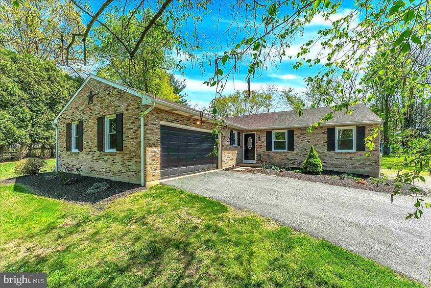 Welcome to your beautiful slice of Southern Chester County! This  meticulously maintained brick-front ranch sits on a picturesque one-acre lot in the coveted Avon Grove School District, offering the perfect blend of country charm and convenience.  Step inside to an impressive great room- this space is huge, filled with natural light from windows and enhanced with recessed lighting that sets the mood for cozy nights or lively gatherings. The wood burning fireplace is a gorgeous focal point and can turn those cold days into instant warmth. The layout flows effortlessly into the sunny breakfast area and the beautifully updated kitchen has an abundance of cabinets and countertops, a stylish tile backsplash, pendant lighting, and a peninsula island to create a space as functional as it is fashionable. Three spacious bedrooms and two full baths, there’s room for everyone to relax. The primary suite features rich bamboo hardwood flooring, a ceiling fan, and a private en-suite bath with a custom-tiled shower and built-in niche! The bamboo floors continue down the hall, leading to two additional bedrooms (each with ceiling fans) and a renovated hall bath with neutral decor. Downstairs, the partially finished basement brings a cool industrial vibe, complete with recessed lighting, luxury vinyl plank flooring, a built-in bar and a laundry room. Perfect for a play room, home office, home gym.  There is even a flex room that was previously used for an in-home salon!    The possibilities are endless! Enjoy summer nights and afternoon BBQ’s on the back patio while taking in the peaceful views and sounds of nature in the gorgeous flat back yard that offers a ton of privacy.  There are two storage sheds for added convenience.  The roof & septic were replaced in (2014) and the vinyl replacement windows were added in (2017).  There is a two-car garage off the kitchen that adds even more convenience. Do you know what else is AMAZING? The location is a dream come true!  This property is tucked into a beautiful neighborhood and walking distance to the Peacedale Park.  Just minutes from the Maryland and Delaware borders.  Right off of Route 896 with easy access to Route 1 and I-95. You’re close to shopping, dining, and major roadways into Newark and Wilmington. This home checks all the boxes: School district, updated, move-in ready, lovingly maintained and the ease of a one floor living lifestyle!