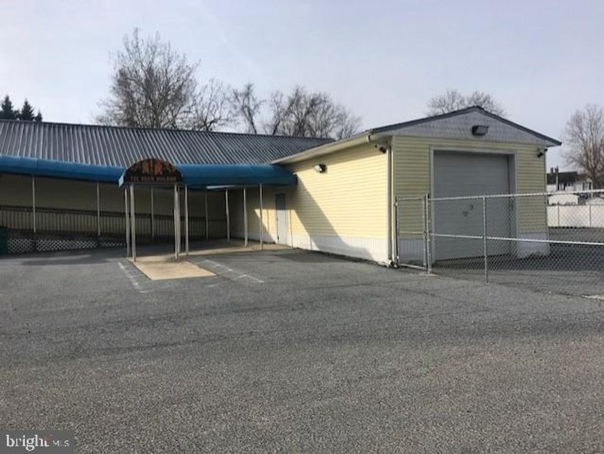 Come tour this massive building located in the Enterprise Zone of Snow Hill with endless possibilities. Public services. Separate electric meters for 4 units (currently). Loading docks, basement, paved parking, HVAC conditioned and a fully fenced in storage lot.