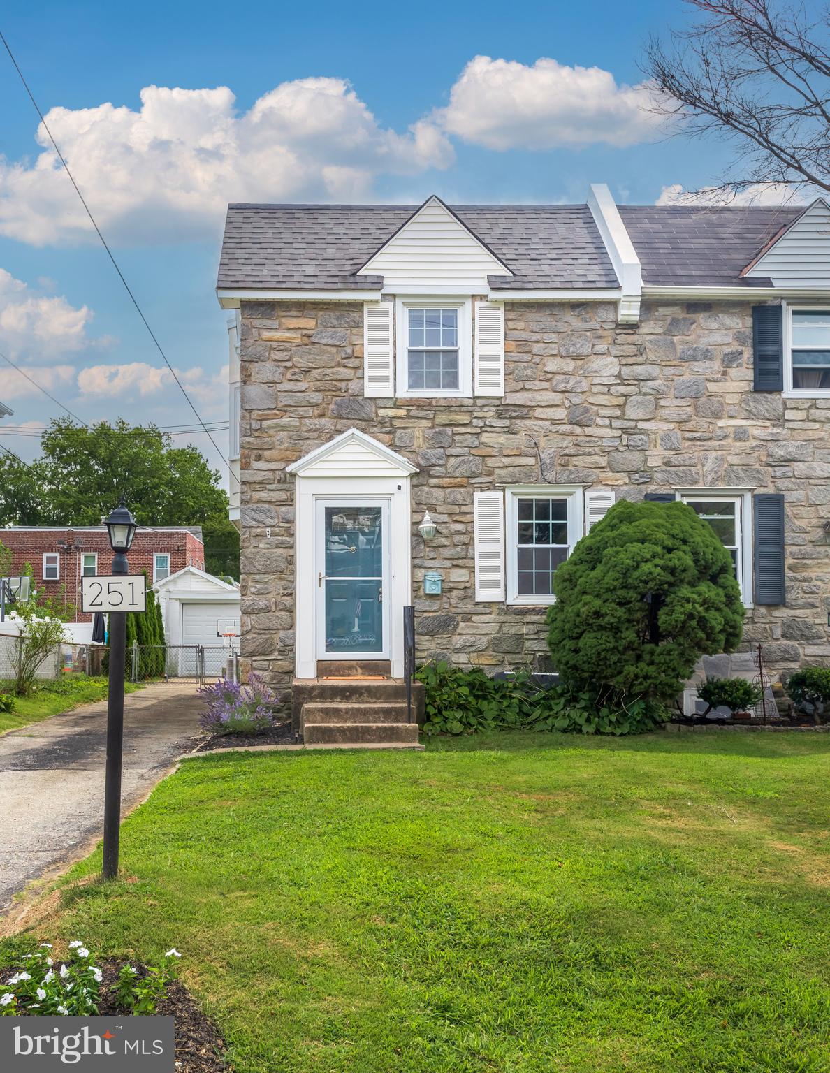 Welcome to 251 Powell Rd, a charming 3-bedroom, 1-bath home in the heart of Springfield, PA. Recent updates include a new roof and a resealed garage roof, ensuring peace of mind for years to come. The original hardwood floors, once hidden under carpet, now shine throughout the home, adding warmth and character. Step inside to a bright and inviting living room that seamlessly connects to the dining area, both filled with natural light. The updated kitchen boasts custom butcher block countertops, ample cabinetry, and a cozy breakfast bar—perfect for enjoying a quick meal or morning coffee. A sliding glass door opens to the back deck, creating an ideal space for indoor-outdoor living. Upstairs, you’ll find the primary bedroom along with two additional spacious bedrooms. They share a beautifully updated full bath featuring new flooring, fixtures, and shelving, while still retaining the home’s original charm. The finished basement offers versatile bonus space—ideal for a home office, recreation room, or media lounge—and also includes the laundry area. Enjoy the convenience of being within walking distance to shops, restaurants, and parks, with easy access to major commuting routes. Don’t miss the opportunity to make this wonderful home yours—schedule your showing today!