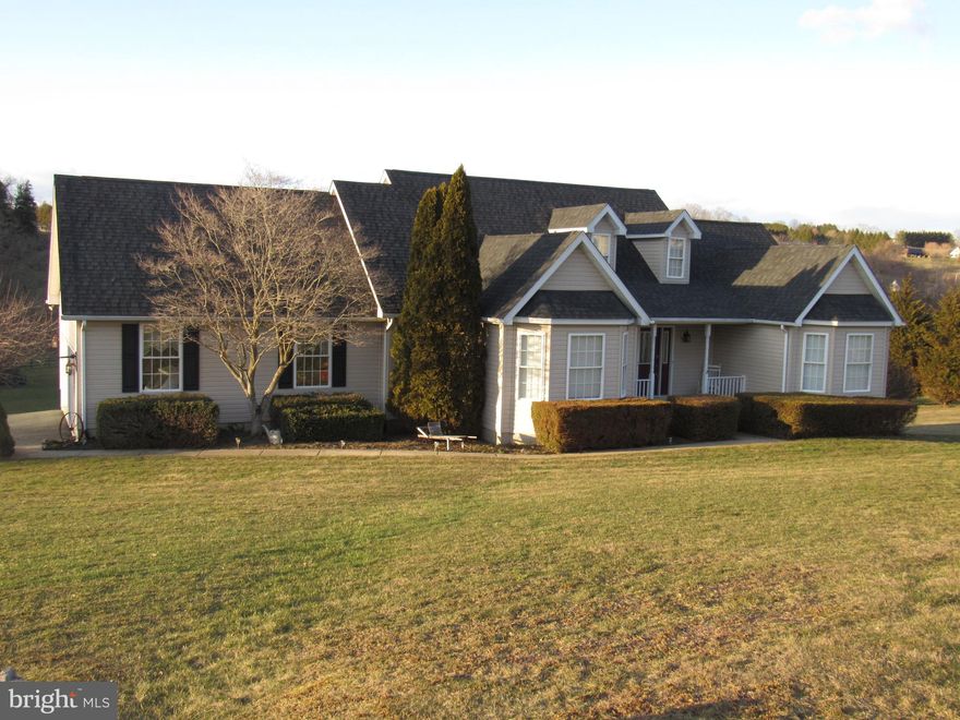 Beautifully maintained by the original owners this raised ranch includes 2.58 acres, finished walk-out lower level, fenced rear yard, stone fireplace with insert, wood stove, new roof, new heat/ac system, some new carpeting and all appliances are included.  Lot does permit for up to 2 horses and the 30x36 storage barn w/stalls will house them. Property shows like a model home. Negot. possession.