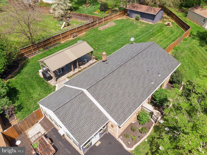 OPEN HOUSE CANCELLED!  Multiple offers received, deadline to submit will be 4 pm on Sunday.  Gorgeous all brick single family home in sought after Hillwood Estates! Sited on a private half acre lot in a cul de sac, this home has been completely renovated from top to bottom!  The amount of work put into this home shows!  From the fully renovated kitchen with upgraded cabinetry, appliances, built in benches with storage, upgraded countertops, all lighting fixtures and fans throughout the home have been replaced, hardwood floors just refinished and freshly painted.  Two fully renovated baths (one on each level) , three bedrooms on the main level and a large den/bedroom in the lower level.  The exterior is completely fenced in with 6 foot paneling for maximum privacy, oversized stamped patio with pergola, built in kitchen with granite , electricity and fans.  Large double shed, wired for a generator (that conveys!), and so much more!  Don't miss out on this amazing home for the price of a townhome!