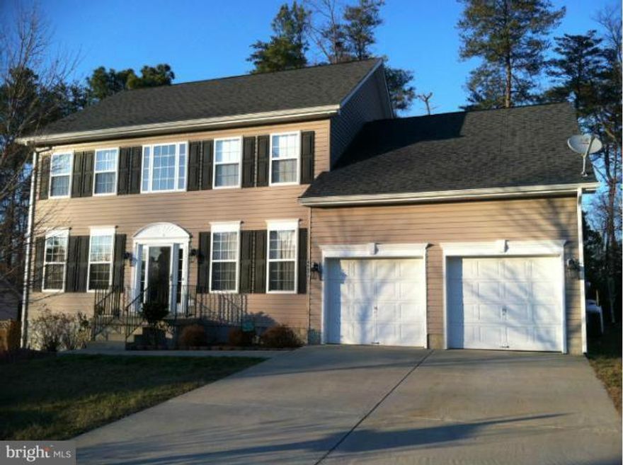 What a beautiful home!  Shows great with lots of room and storage. 4 bedroom 2.5 bath.  Huge master with cathedral ceilings, grand master bath with soak tub and stand-in shower.  Formal living, dining room, office, 2 story foyer.  Open kitchen with island and breakfast area.  Unfinished basement with lots of storage room. 2 car garage and large deck.