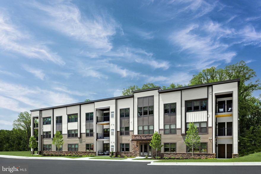 ***ASK ABOUT OUR GENEROUS CLOSING ASSISTANCE......
Quick Delivery (Est. Jan 2024 ) Condominium.  Home includes 1156 Square Feet, 2 Bedrooms, 2 Full Baths, Updated Cabinets and Design Palette and Electrical Features. Welcome to Ryan Homes at Ravenwood at Turf Valley. Howard County’s only new construction 1-level condo flats featuring on-site amenities, restaurants and shopping with easy access to I-70. Our homes are designed to make your life easier with open and modern designs connecting all the spaces you use most! Plus, our condo flats all offer all the conveniences of main-level living and elevator access. The Emerald is a gorgeous condo where affordability meets luxury! Just off the foyer, the gourmet kitchen features a large island with plenty of room for preparing home cooked meals. The adjoining great room and dining room combine to make an ideal space for gathering with family and friends. A full bath and laundry room are both located off this main area near a spacious bedroom. Your luxurious primary suite includes its own dual vanity bath and a huge walk-in closet. Step outside and enjoy the fresh air on your large balcony. The Emerald has everything that makes it a great place to live.  Your new home includes a new home warranty, a huge kitchen island, spacious walk-in closets and so much more! Experience the boundless natural beauty of Ellicott City and experience everything from shopping, spa treatments, and dining at top-of-the line restaurants at Turf Valley Towne Square. Plus, Ravenwood at Turf Valley is conveniently located just off I-70 making this location an easy drive to BWI, Historic Ellicott City, Baltimore and Washington, D.C. within driving distance. Not only will you be upgrading where you live, but how you live. Come see why you'll love all that Ravenwood at Turf Valley has to offer and schedule your visit today! Please Note: Lot premiums may apply; other floorplans and homesites may be available.  All Photos are representative.