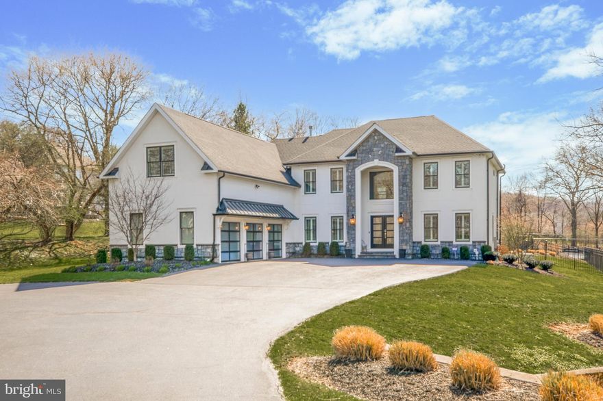 Welcome to this spectacular home nestled on a private 2.73 acre cul-de-sac lot in the coveted Lafayette Hill area. This meticulously renovated residence offers an unparalleled blend of luxury and comfort featuring a stunning black bottom saltwater inground pool, extensive paver patio with an outdoor kitchen with built-in grill and pizza oven plus a tennis court creating your very own summertime retreat.  As soon as you step into the grand 2-story foyer, you'll immediately realize this home is special. The gracious living room adorned with bamboo flooring and an upgraded chandelier seamlessly flows into the spacious dining room also featuring bamboo flooring and an upgraded chandelier providing an ideal setting  for special occasions. The impressive 2-story family room boasts a floor-to-ceiling stone fireplace with mantle, offering picturesque views of the backyard oasis.  Entertaining is so easy since it seamlessly connects to the chef's dream kitchen appointed with top-of-the-line upgrades including Wolf appliances (an 8 burner duel fueled range), honed quartzite countertops, custom cabinetry, a butlers pantry with beverage center, wine fridge, ice maker and an adjacent breakfast area with a walk in pantry. .Also on  the main level, you'll find a versatile den/office with a built-in surround sound system perfect for a home office or relaxation space, as well as a powder room, a well-appointed laundry room and a 3 car garage.  Retreat to the upper level where the lavish master suite awaits featuring an amazing walk in closet with exquisite built-ins, 2 additional walk-in closets, a gas fireplace and a spa-like master bath adorned with a luxurious slipper tub with air jets, an oversized shower with dual showerheads, a gorgeous vanity, private toilet room  that won the Builders Choice award for best remodel!   Three additional bedrooms, including an ensuite with a beautifully renovated bath, a walk in closet with built-ins and a renovated hall bath complete the 2nd floor.  Wait there's more!  The lower level  offers a fully finished space with a workout area, bedroom, renovated full bath, and a mini kitchenette which could be perfect for an in-law suite or au pair.  Additional features include new roof in 2020, new stucco in 2019 with a 10 year transferable warranty,  Generac full house generator in 2021, new garage doors in 2020, all new Pella windows and doors in 2020, new hot water heater in 2023, pool replastered in 2014 and converted to salt water in 2020, basement refinished in 2021, hall bath renovated in 2021, ensuite bath renovated in 2018 and a 2 zone HVAC system - one system replaced in 2021 and the other system is about 10 years old.  All you need to do is unpack and make this extraordinary residence your own and experience luxury living at it's best! This is the home you've been waiting for!