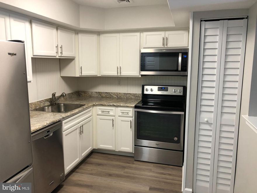 Welcome to this affordable home with TILE ENTRANCE, NEW CARPETS and LAMINATE FLOORING,  Large Living and Family Room w/ sliding door to private fenced in backyard that includes a storage shed.  Lots of cabinet space in your renovated kitchen, a first floor Powder Room, two spacious Bedrooms upstairs, with a double sink bathroom. This home even includes a BONUS ROOM on the first floor that can be used as a OFFICE, or PLAYROOM.  Bike trail is close by, first floor laundry with WASHER, DRYER & REFRIGERATOR included, and so much more!!!Come see this Fabulous home in the Hickory Ridge neighborhood.