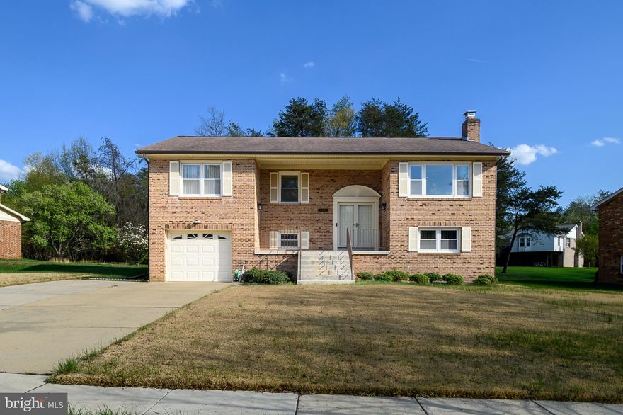 Lovingly cared for by the same owner for more than 40 years, this Beautifully maintained all Brick split-foyer Home reflects TRUE Pride of ownership at every turn. From the moment you step inside, you’ll notice the warmth of gleaming hardwood floors, elegant crown molding, and timeless ceramic tile details that give the home both character and comfort. 
The Heart of the Home - the Updated Kitchen (2020) - offers modern style and functionality, now complemented by brand-new Stainless Steel Appliances installed in 2026, making it perfect for everyday living or hosting family and friends.

Step outside and you’ll find spaces designed to enjoy every season. The screened-in porch, added within the last seven years, creates the perfect setting for morning coffee, summer evenings, or simply relaxing while overlooking the yard. The private bedroom balcony off the Primary Bedroom, also added in recent years, offers a peaceful retreat where you can either start with the Sunrise or unwind at the end of the day.
**ADDITIONAL BONUS**
This home offers exceptional access to major employment centers, military installations, and regional travel hubs, including Joint Base Andrews just 7 miles away (approximately 10–15 minutes), the Washington Navy Yard roughly 12–14 miles (20–30 minutes) via Branch Avenue and I-295, and Joint Base Anacostia-Bolling within 15–18 miles (about 25–30 minutes). Commuters will appreciate easy access to Branch Avenue (MD-5), I-495 (Capital Beltway), and key routes into Washington, D.C., Northern Virginia, and surrounding Maryland counties. Air travel is equally convenient with Ronald Reagan Washington National Airport (DCA) approximately 16–19 miles away (around 25 minutes), Baltimore/Washington International Airport (BWI) about 40–50 minutes, and Washington Dulles International Airport (IAD) within 45–60 minutes. The location is further enhanced by close proximity to shopping, dining, and everyday conveniences in Clinton, Camp Springs, and National Harbor—making it an ideal fit for military, federal, and commuter lifestyles.

Homes that have been this well loved and maintained for decades are rare. This one offers the perfect combination of classic charm, thoughtful updates, and a sense of home that has been cherished for generations and awaiting the Next Loving Family to make their Memories in the Future Generations.

"Don't forget to look at the Comprehensive Floor Plans "